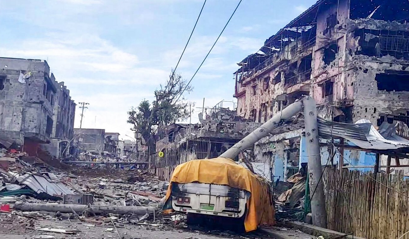 Damaged buildings in Marawi City, Mindanao, where more than 200 people have been killed in ongoing clashes between militants linked to Islamic State and the Philippine Army. Photo: EPA