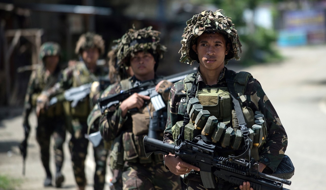 Philippine soldiers patrol in Marawi, where they are locked in fierce combat with hundreds of militants linked to Islamic State. Photo: AFP