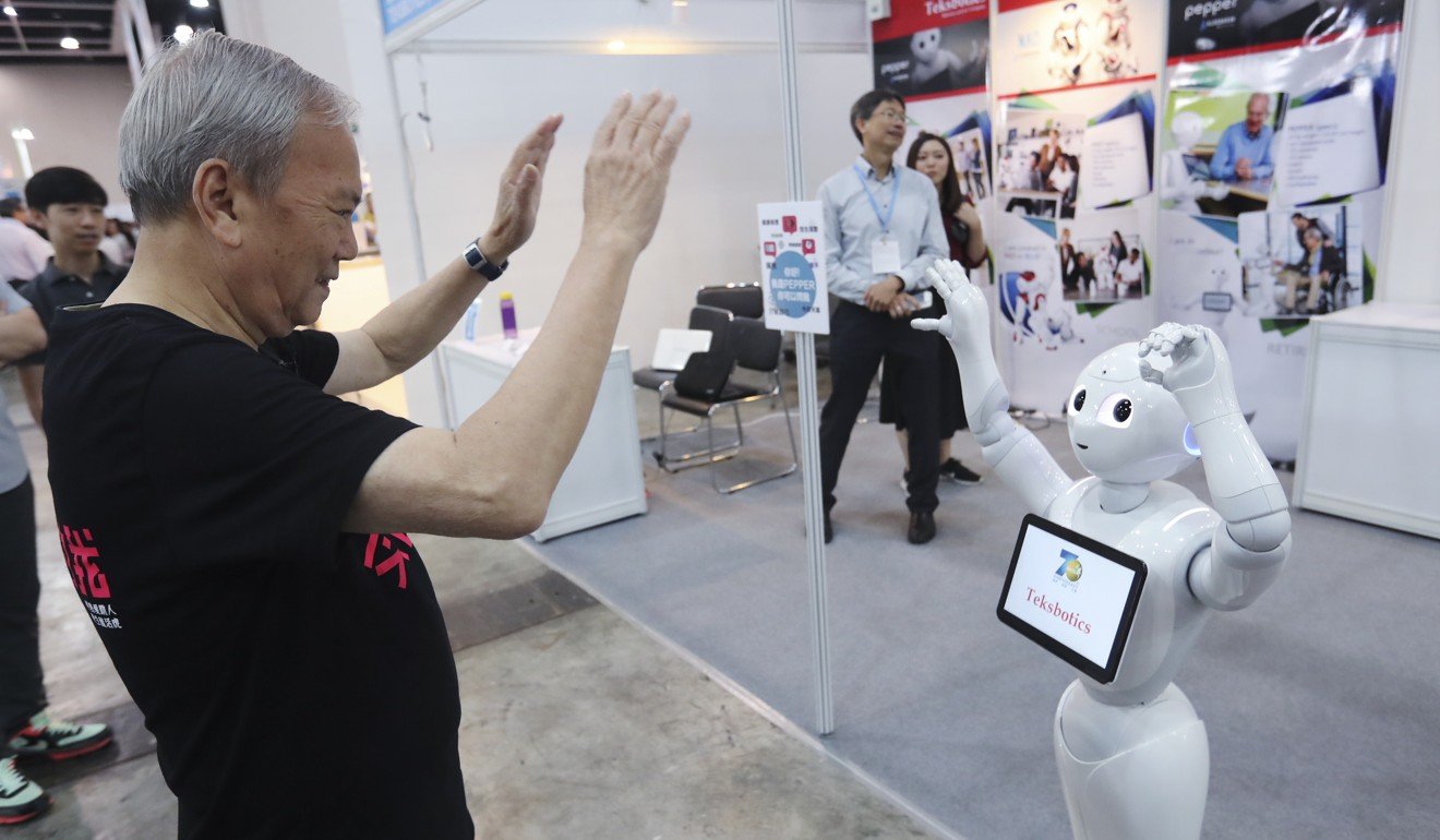 The robot was designed to interact with elderly patients and kept them active and cheerful, one visitor to the expo said. Photo: Edward Wong