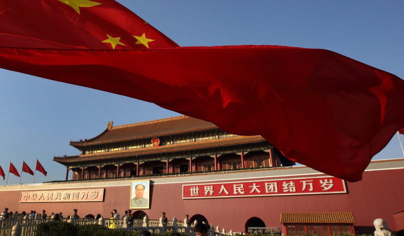 A Chinese flag flies in front of Tiananmen Gate in Beijing. The Democratic Party is highly critical of the Chinese political system. Photo: Bloomberg