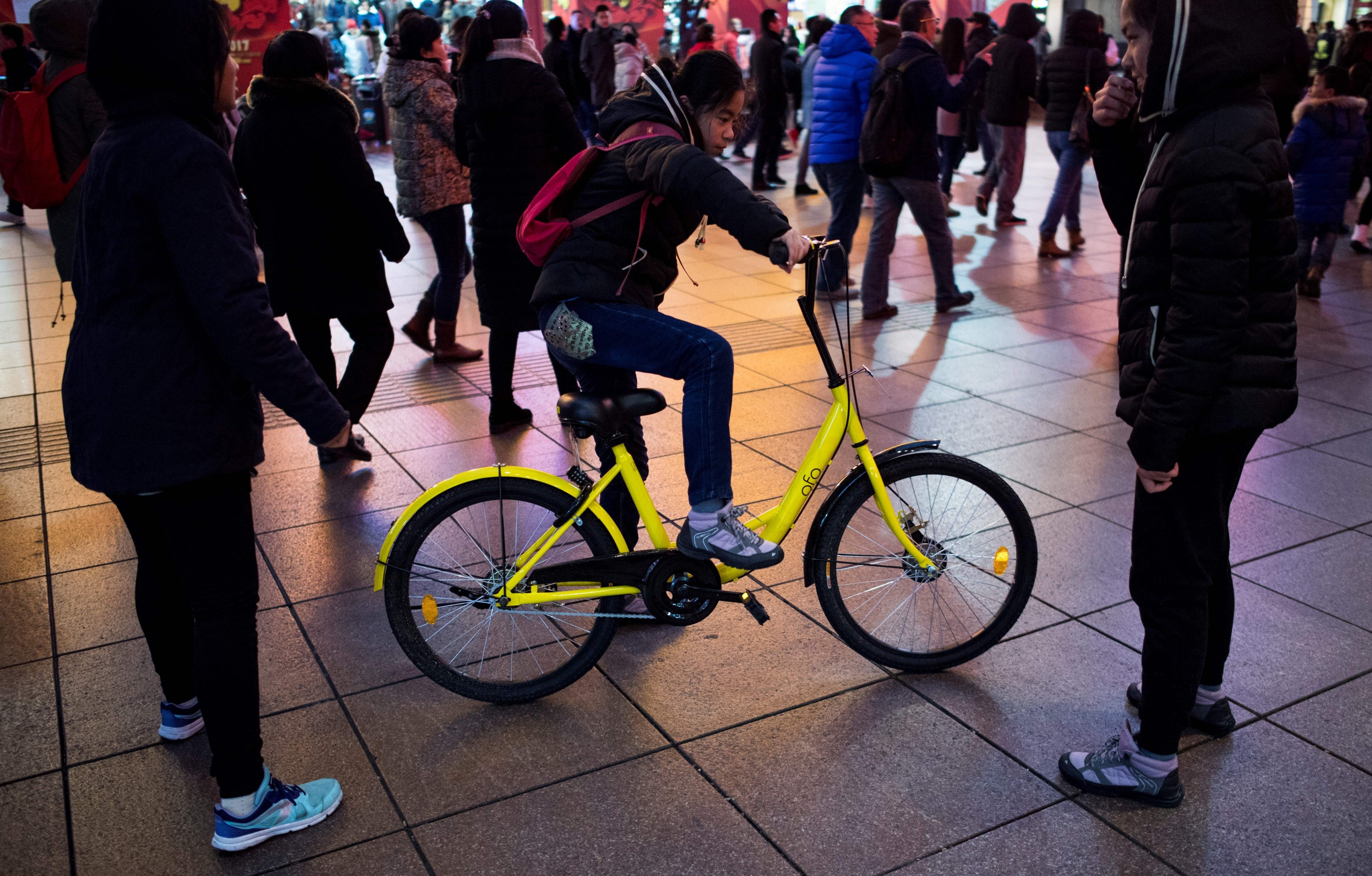 Bicycle sharing start-ups, such as OFO, have generated huge buzz in China this year, raising the profile of entrepreneurship amount the nation’s youth. Photo: AFP