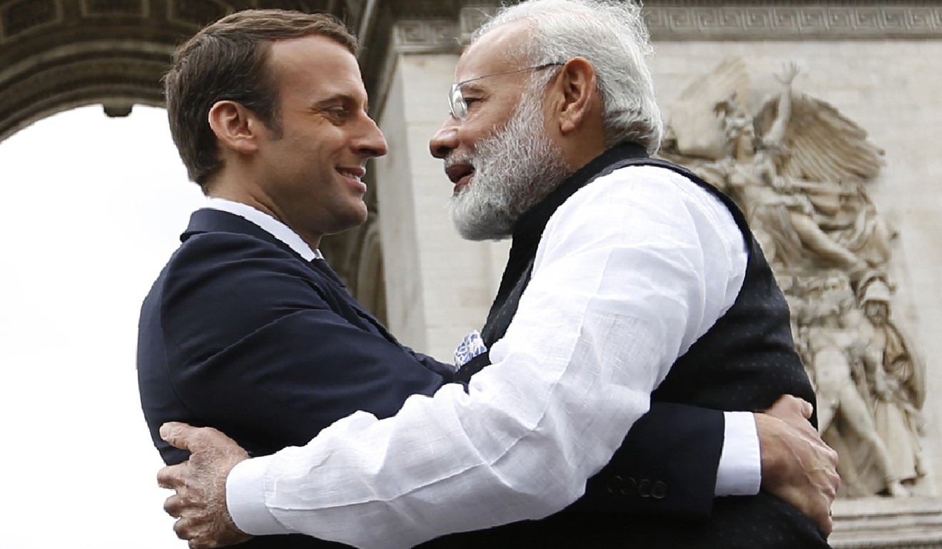 Indian Prime Minister Narendra Modi says goodbye to French President Emmanuel Macron after a ceremony at the Arc de Triomphe in Paris on the last leg of his four-nation visit, on June 3. Photo: AFP