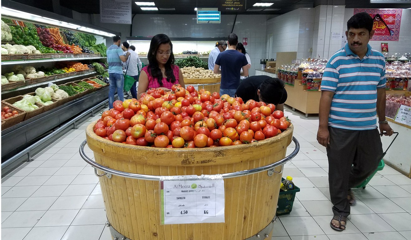 Customers flocked to Qatar's markets when the blockade was announced, clearing some shelves, but larger stores like the local AL Meera chain have flown in replacement goods from allies. Photo: Los Angeles Times