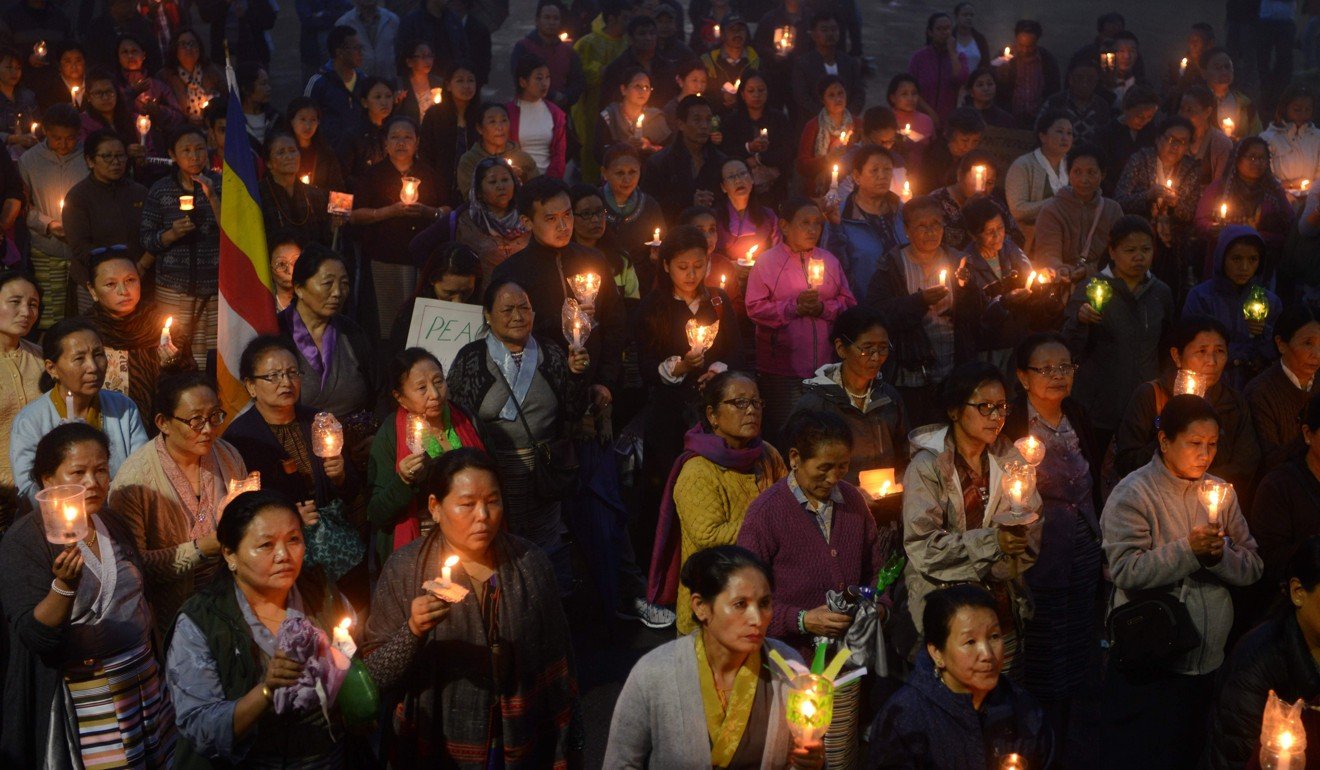 A vigil for those killed in clashes with police during an indefinite strike called by the GJM in Darjeeling. Photo: AFP