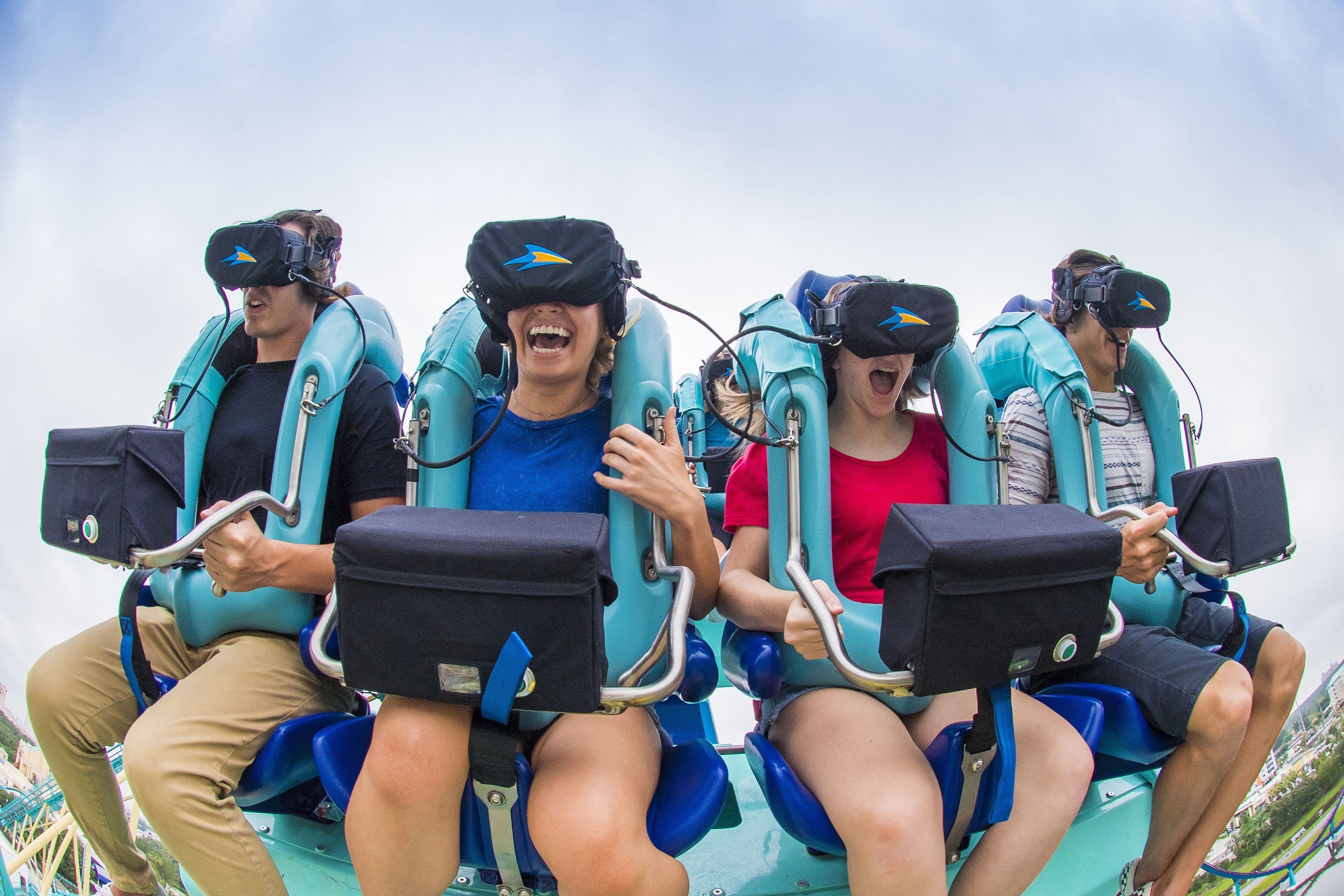 As the “Kraken” roller coaster speeds through a loop and turns upside down, virtual reality headsets send the riders on an undersea adventure, at SeaWorld Orlando in Florida. Photo: TNS