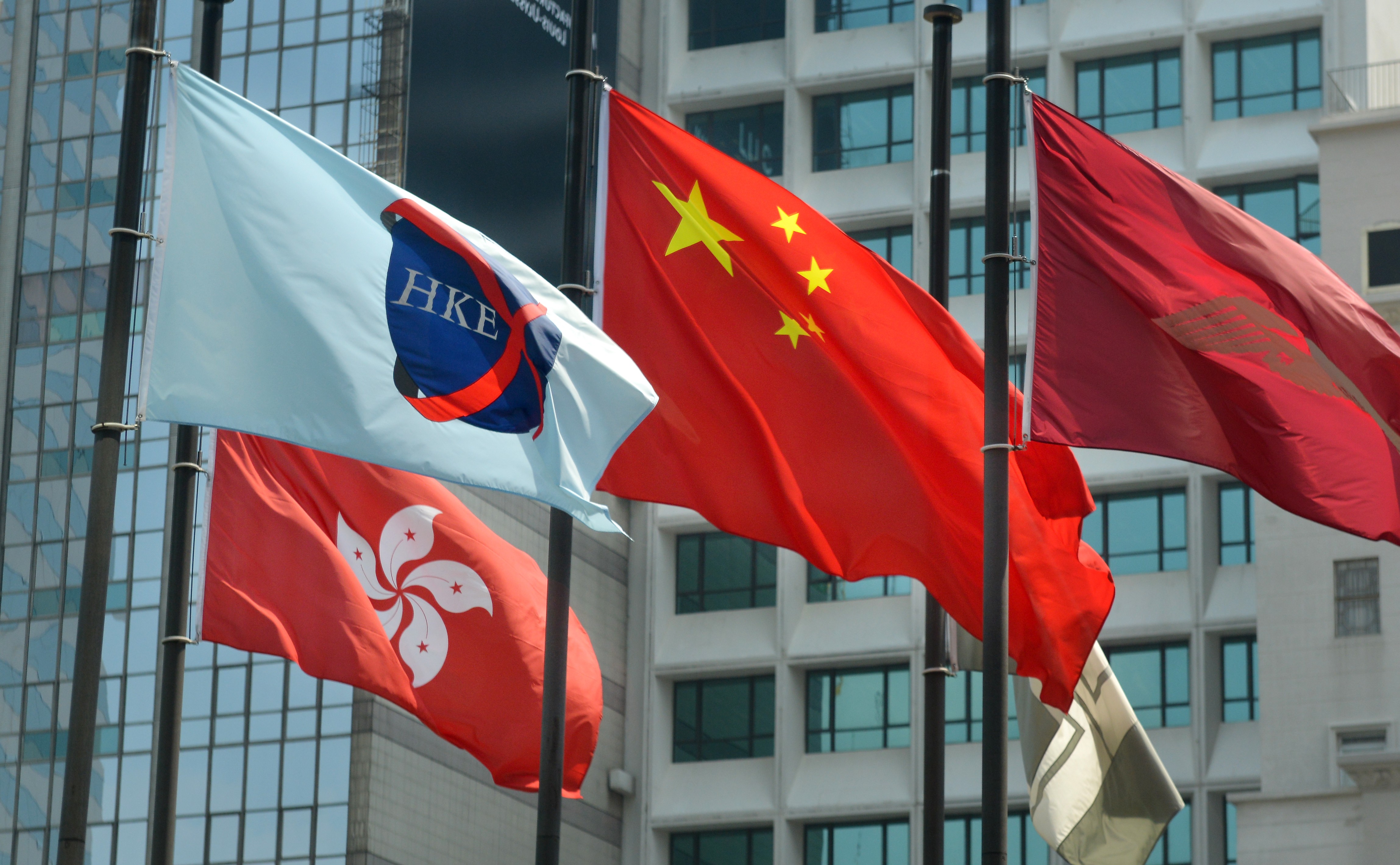 A flag of Hong Kong Exchanges and Clearing Limited (HKEx) flying at Exchange Square. Photo: SCMP