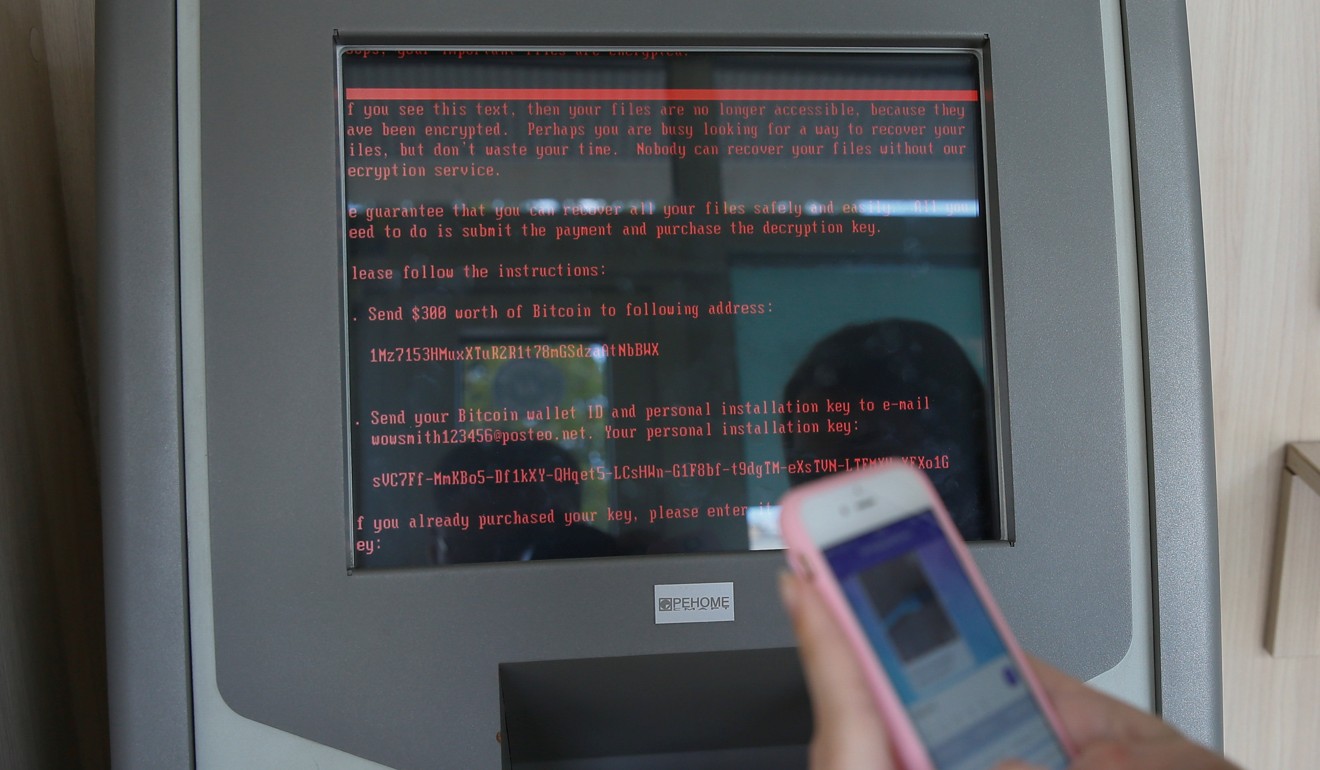 A message demanding money is seen on a monitor of a payment terminal at a Kiev branch of Ukraine's state-owned bank Oschadbank on Tuesday after Ukrainian institutions were hit by a wave of cyber attacks. Photo: Reuters