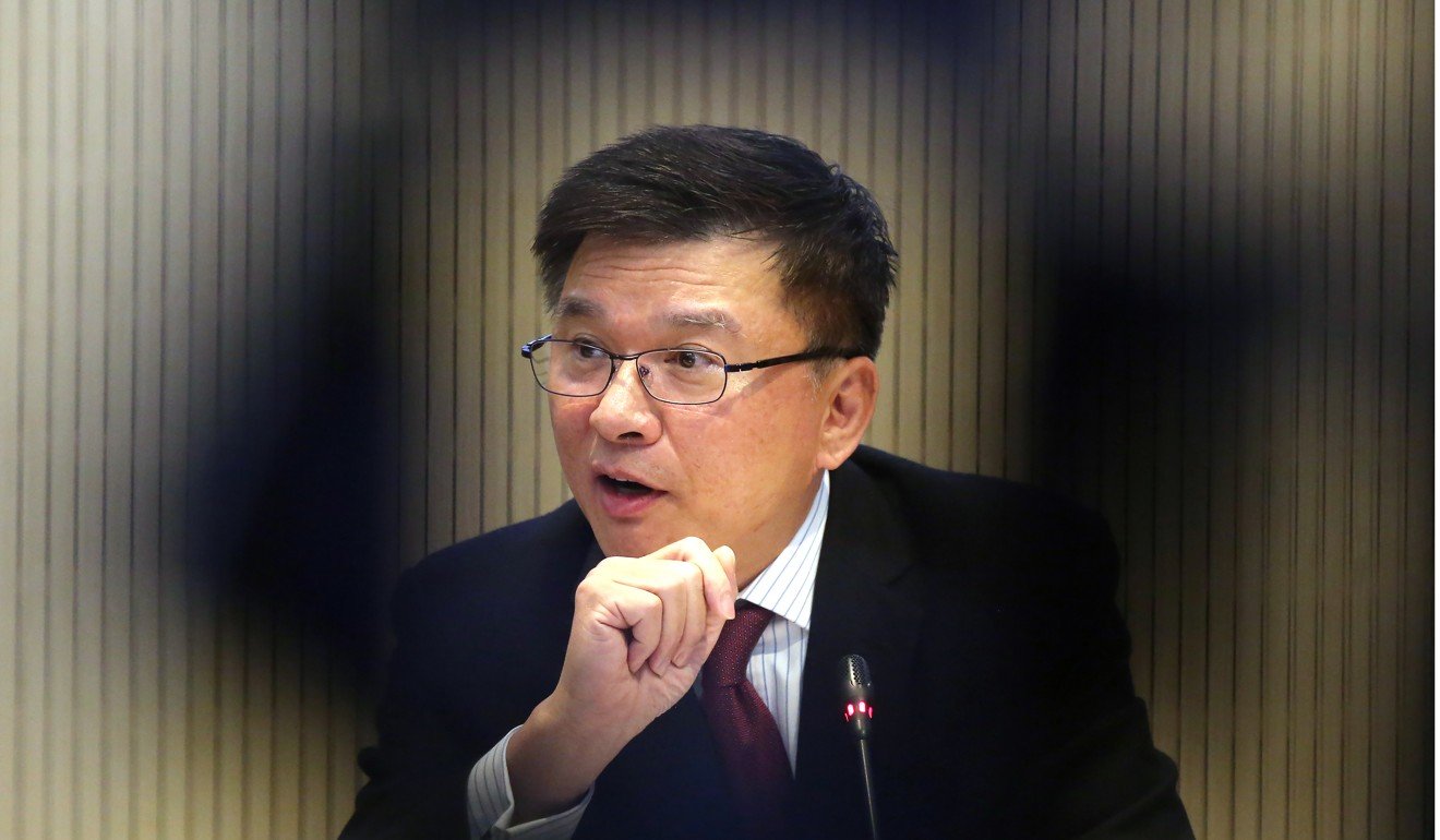 Hong Kong Secretary for Financial Services Ceajer Chan Ka-keung briefs media on fintech developments in February last year. Photo: Edward Wong