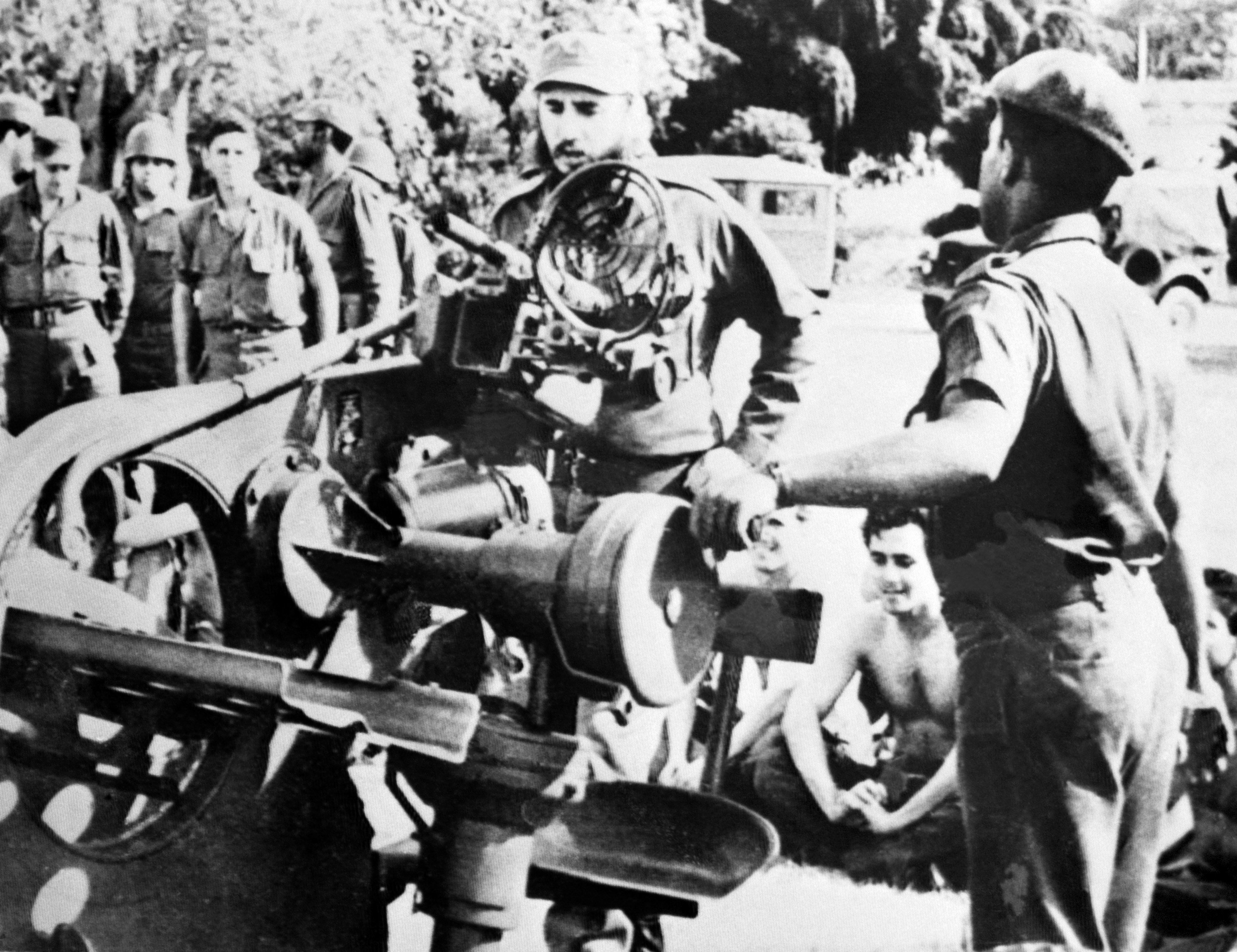 Cuban leader Fidel Castro (centre) inspects weapons at a military base on November 2, 1962, during the missile crisis. The crisis represented the closest point the world had come to nuclear warfare after the second world war. Photo: AFP