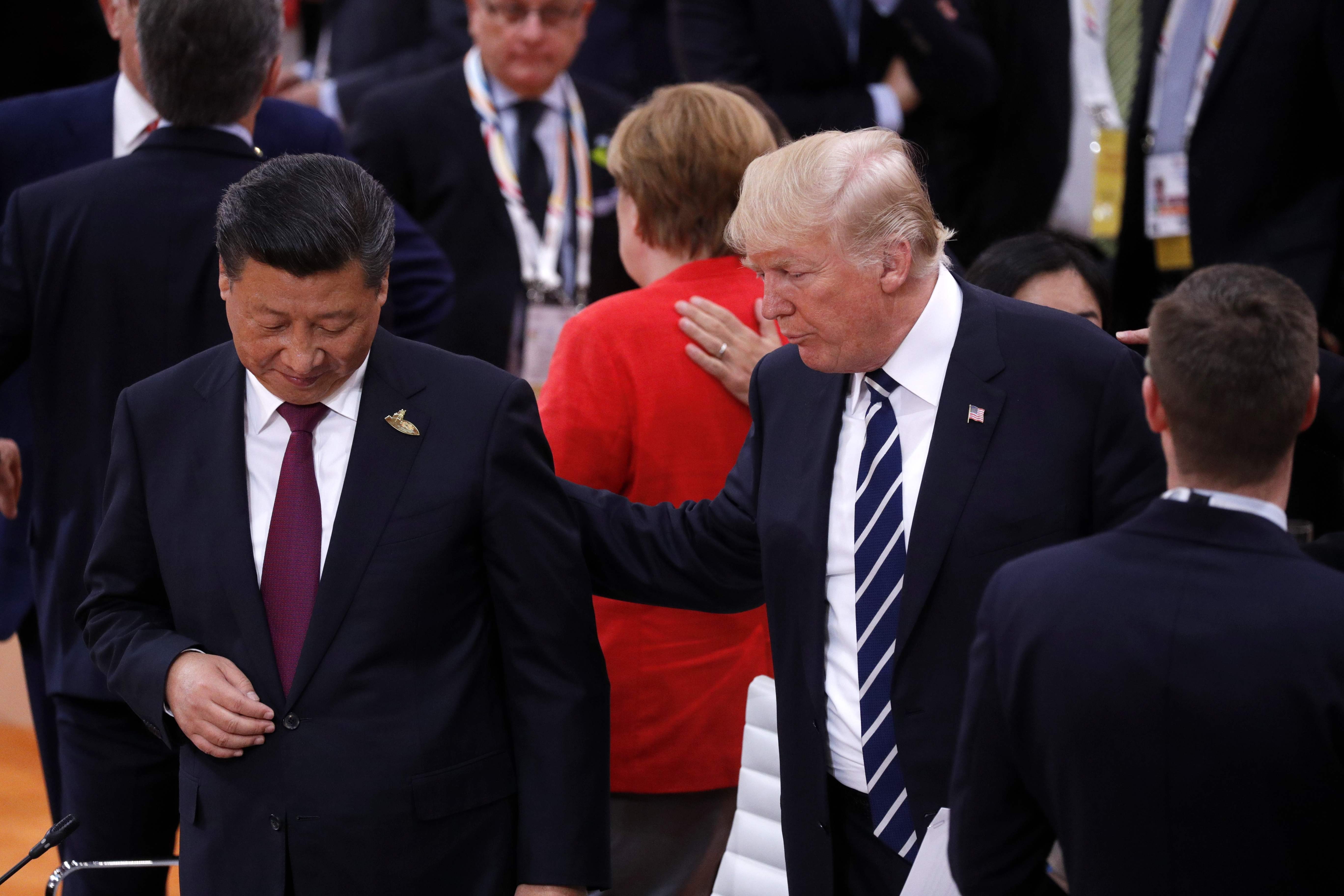 US President Donald Trump has a word with President Xi Jinping at the start of the first working session of the G20 meeting in Hamburg on July 7. The biggest flashpoint in US relations with a rising China is without question North Korea. Photo: AFP