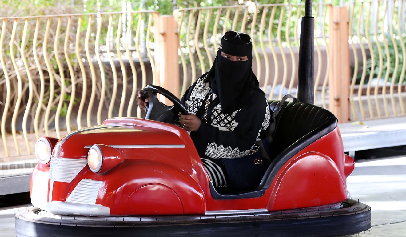 A Saudi woman enjoys celebrations at King Abdulaziz Park in Riyadh, Saudi Arabia. Photo: EPA
