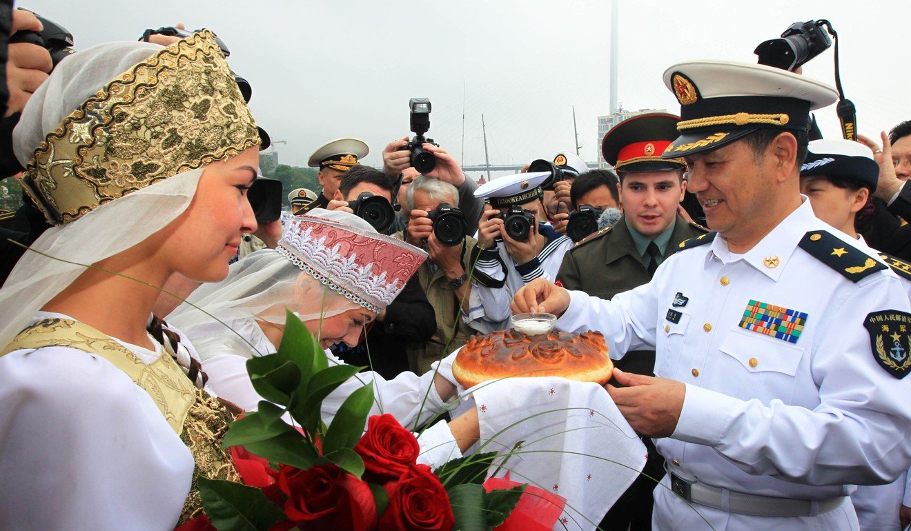 Commander Yang Junfei is welcomed upon the Chinese naval fleet’s arrival in Vladivostok for joint drills, in July 2013. Photo: Xinhua