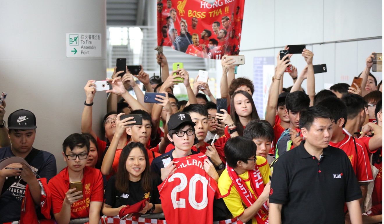 Liverpool received a warm welcome at Hong Kong International Airport. Photo: Felix Wong