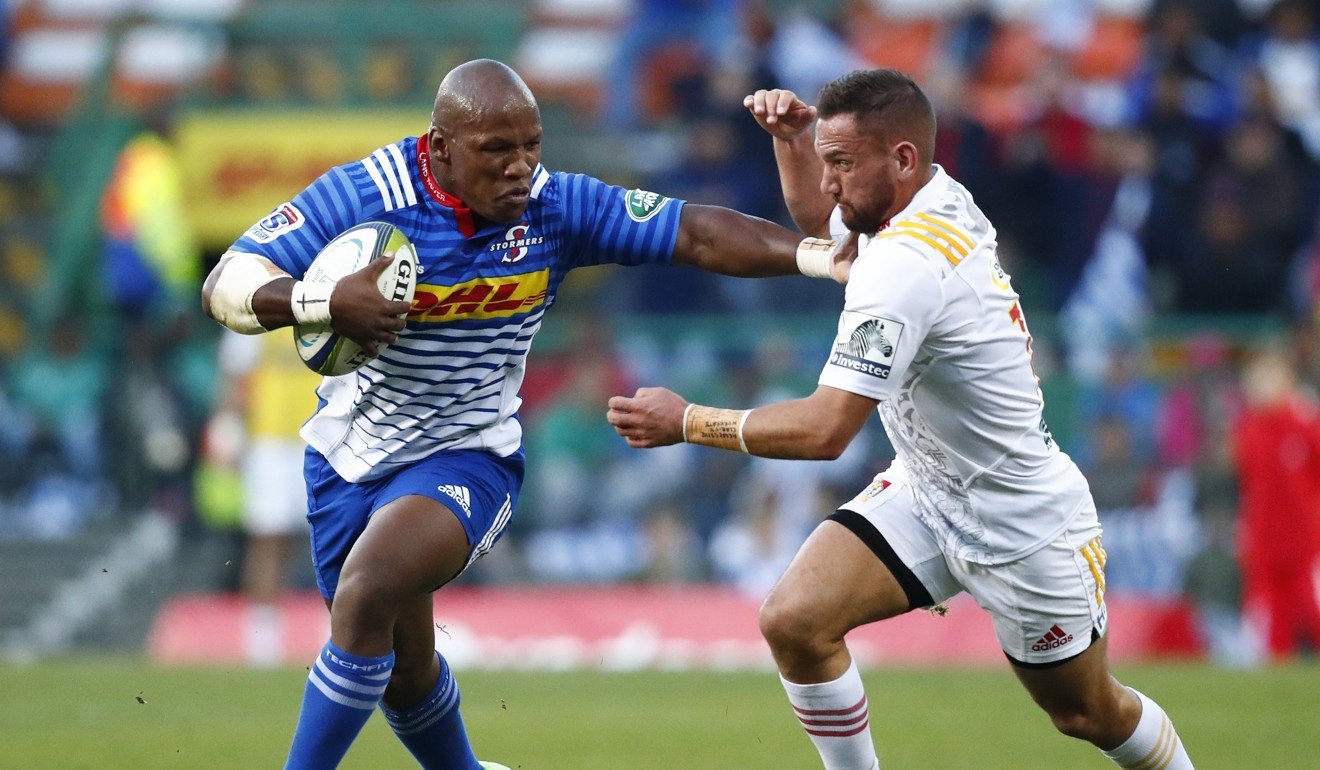 Chiefs’ captain Aaron Cruden attempts to tackle Bongi Mbonambi of the Stormers. Photo: EPA