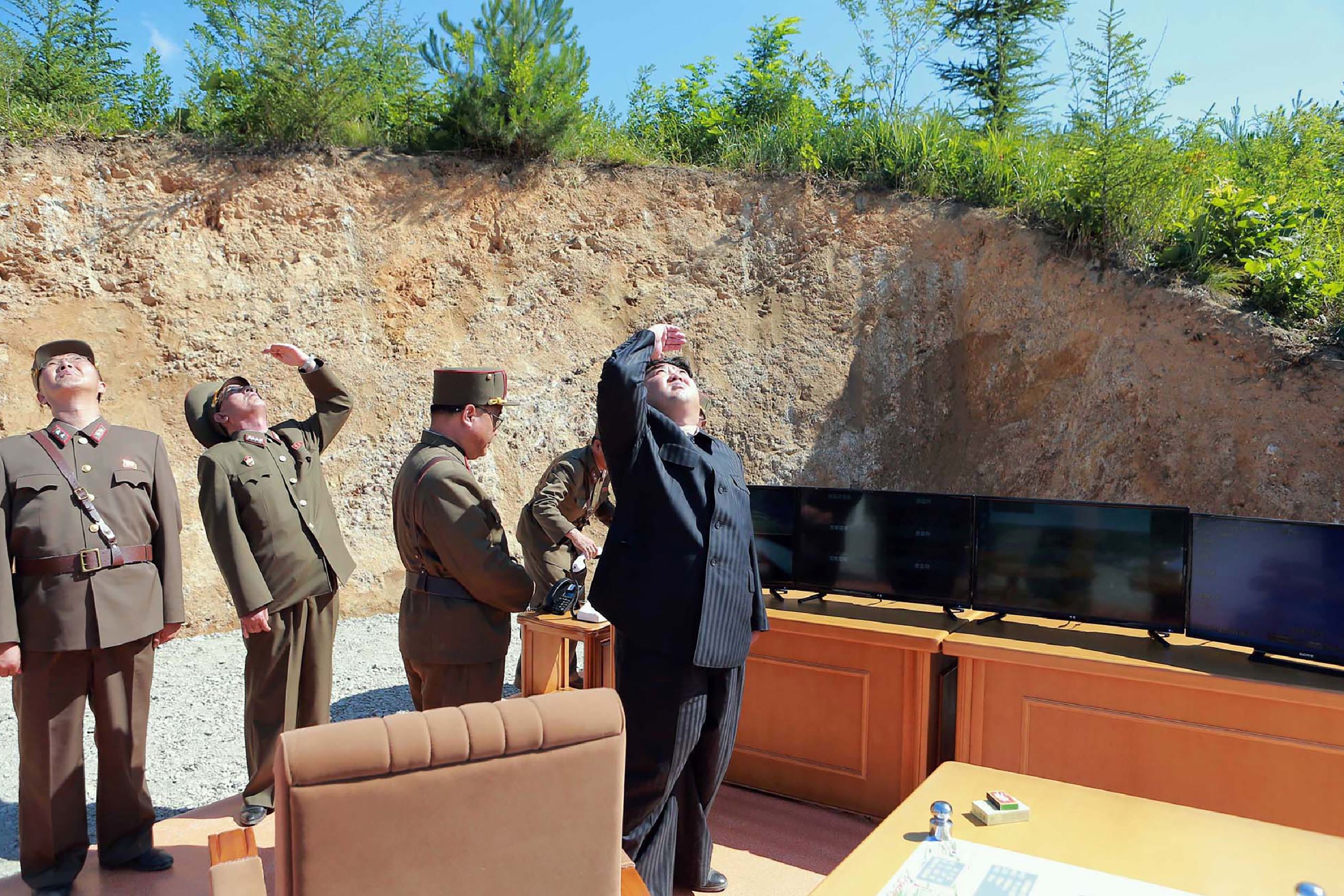 North Korean leader Kim Jong-un inspects the successful test-firing of the intercontinental ballistic missile Hwasong-14, at an undisclosed location on July 4. Photo: AFP/KCNA via KNS
