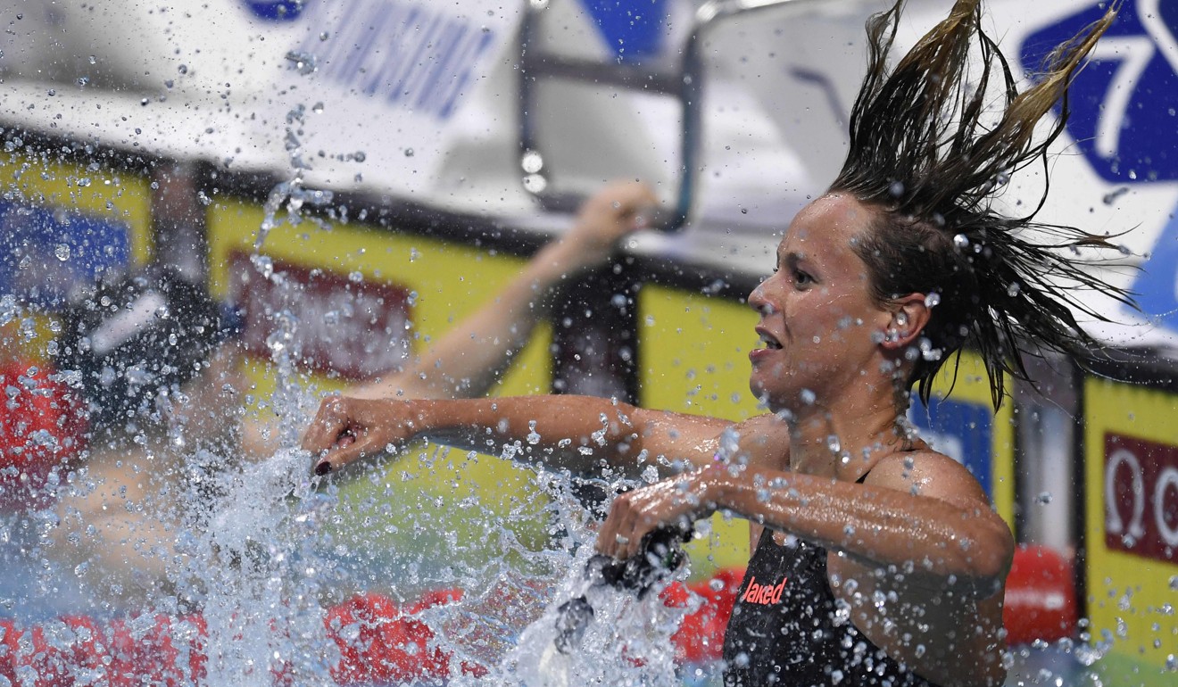 Italy’s Federica Pellegrini celebrates after winning the women’s 200-metre freestyle final. Photo: AFP