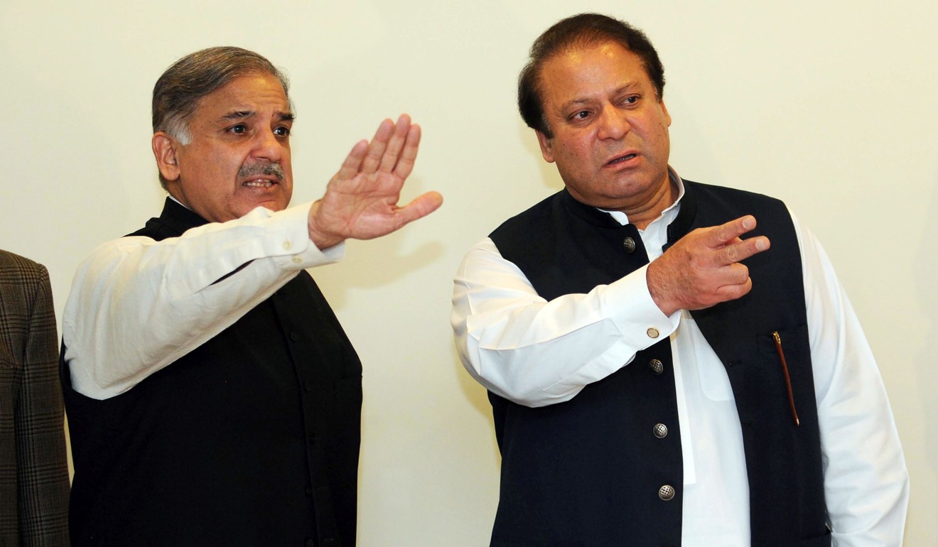 File photo of former Pakistani prime minister Nawaz Sharif (right) with his brother Shahbaz. Photo: AFP