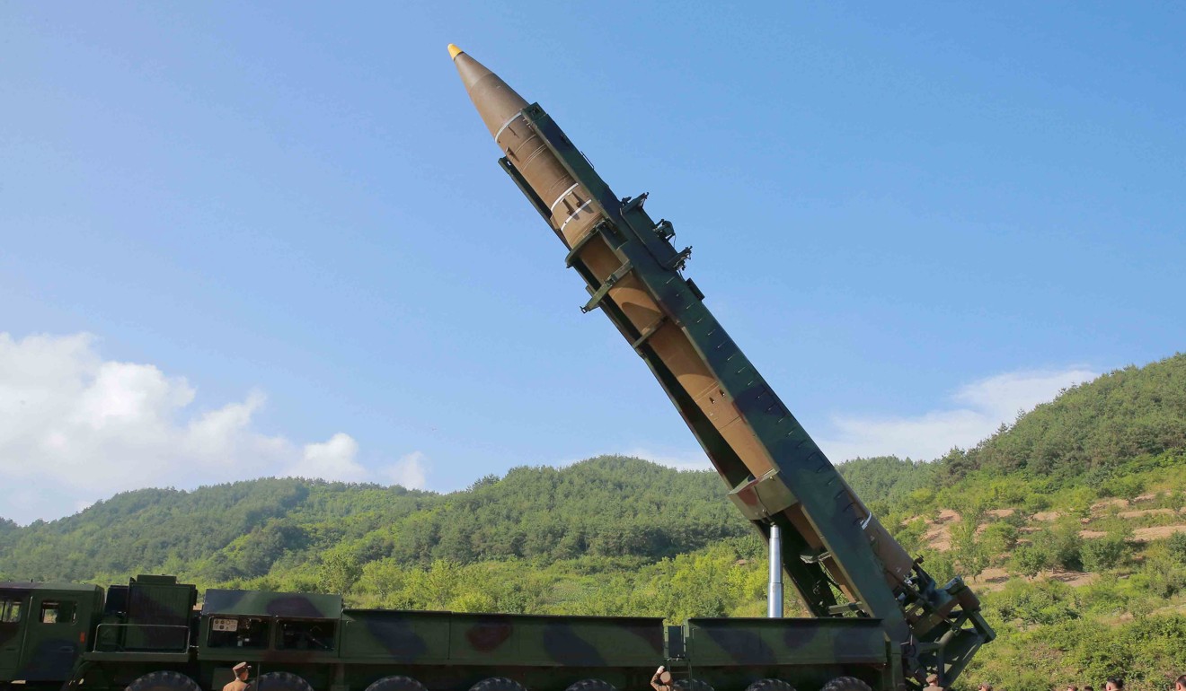 A handout photo made available by the official North Korean Central News Agency (KCNA) allegedly shows the North Korean inter-continental ballistic rocket Hwasong-14 being prepared before a test launch. Photo: KCNA via EPA