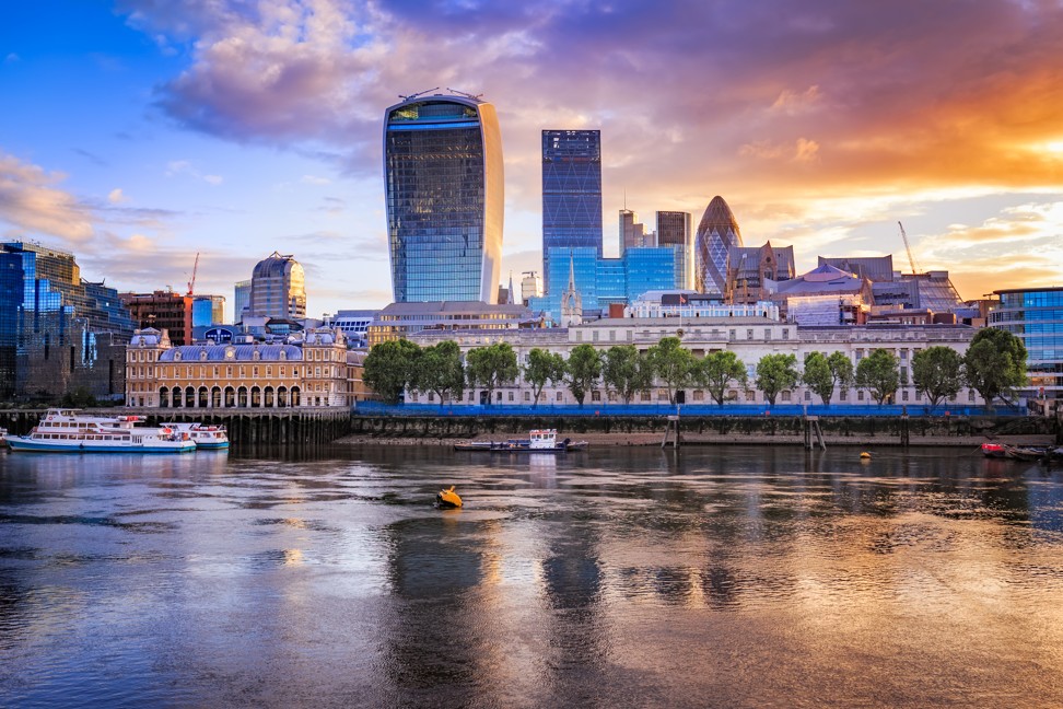 London cityscape during sunrise with its reflection from river Thames. The tall building on the left, affectionately known as the “Walkie Talkie”, was sold last week to the Hong Kong family behind the Lee Kum Kee brand of oyster sauce. Photo: Shutterstock