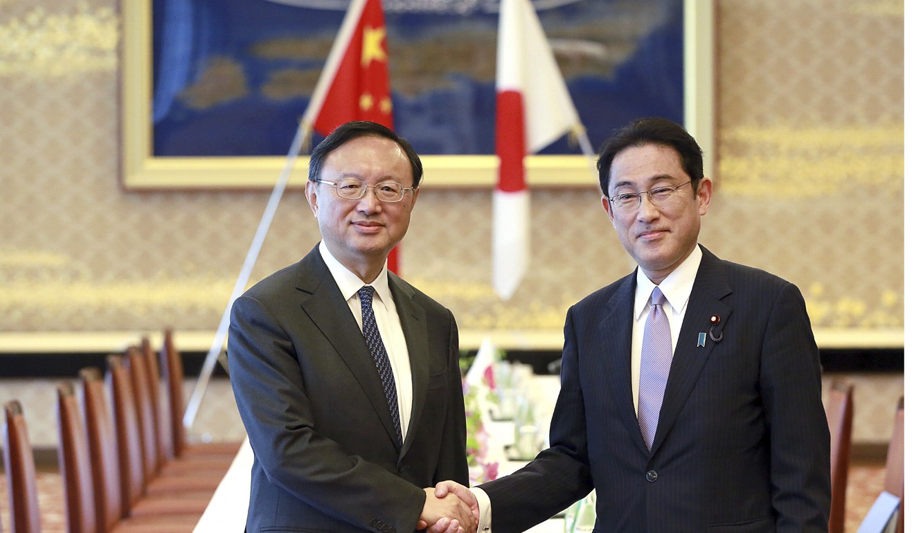 China's State Councillor Yang Jiechi, left, and Japanese Foreign Minister Fumio Kishida. Kishida is tipped to get a new role in a cabinet reshuffle. Photo: AP