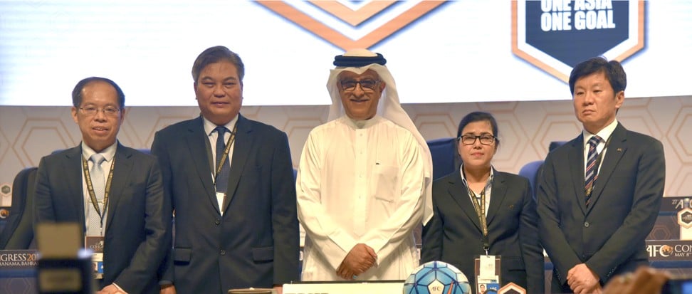 China Zhang Jian (left) with AFC president Shaikh Salman bin Ebrahim Al Khalifa (third left)) at May’s AFC Congress. Photo: Xinhua