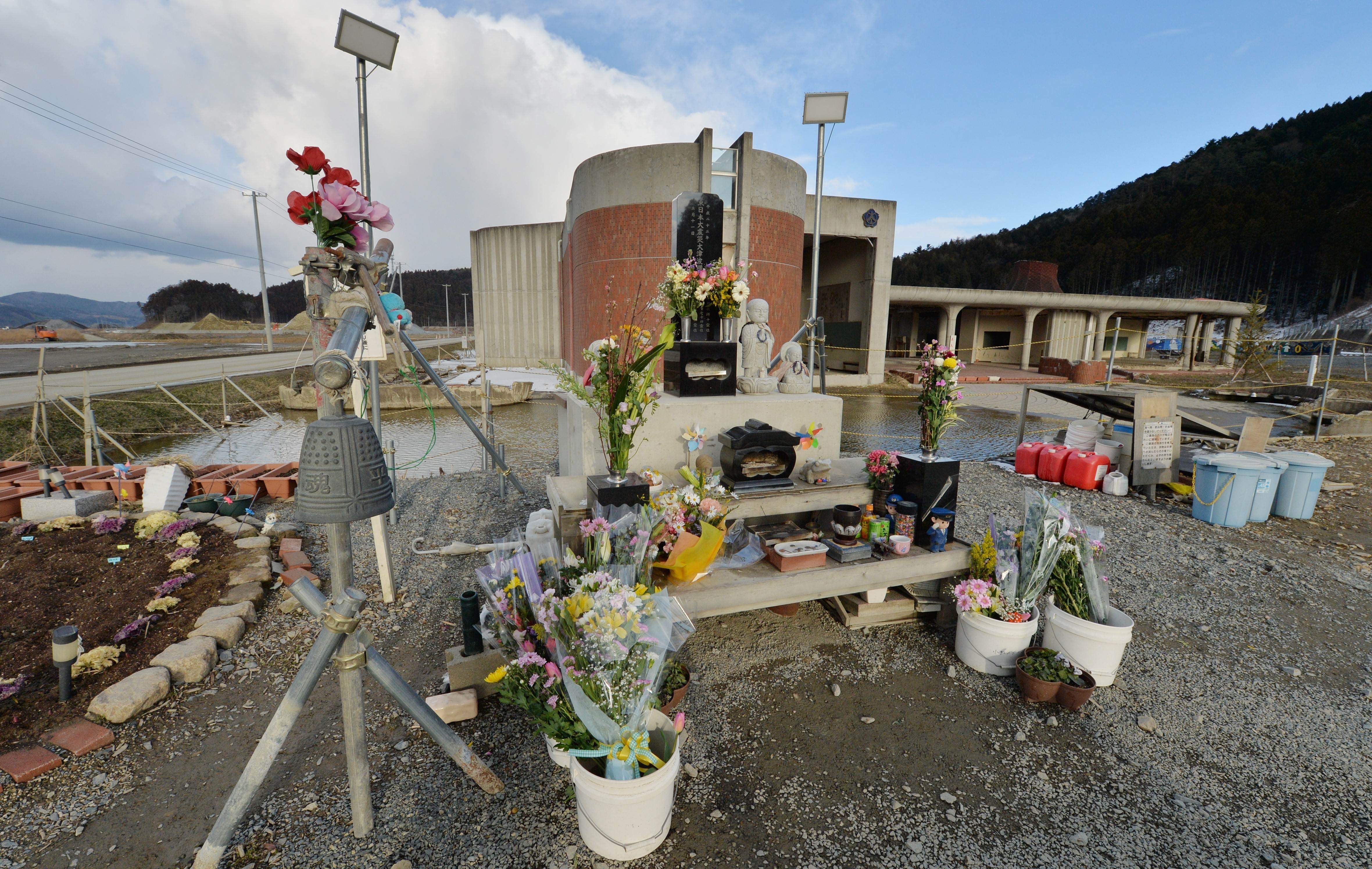 A cenotaph for victims of the 2011 Japan tsunami stands in front of the former Okawa Elementary School in Ishinomaki, Miyagi prefecture, where 74 children and 10 teachers died. Photo: AFP