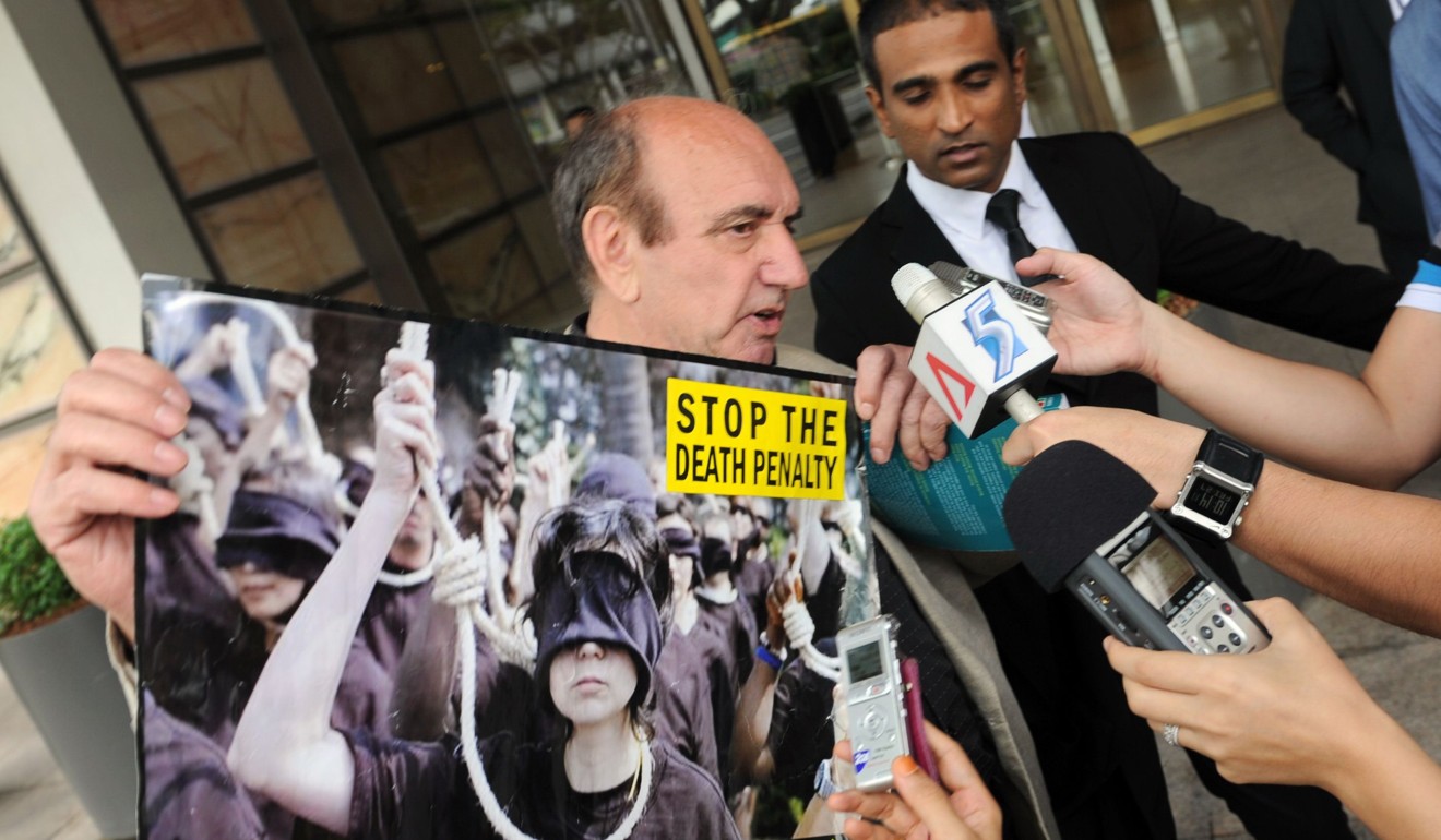 British author Alan Shadrake outside the Supreme court in Singapore. Photo: AFP