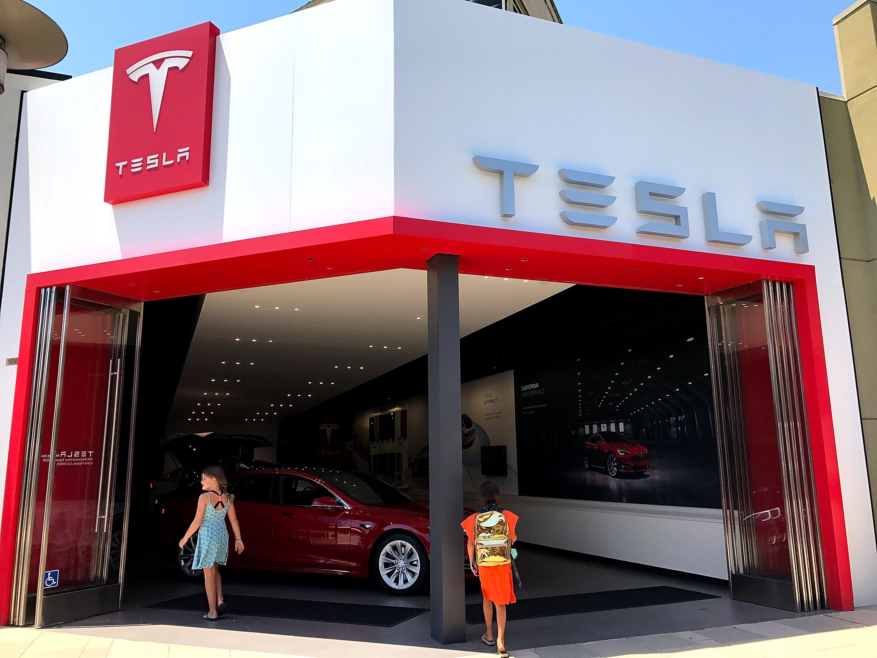 By merely posting less-than-expected losses, Tesla increased its share price by more than 6 per cent in after-market trading. Photo: AFP