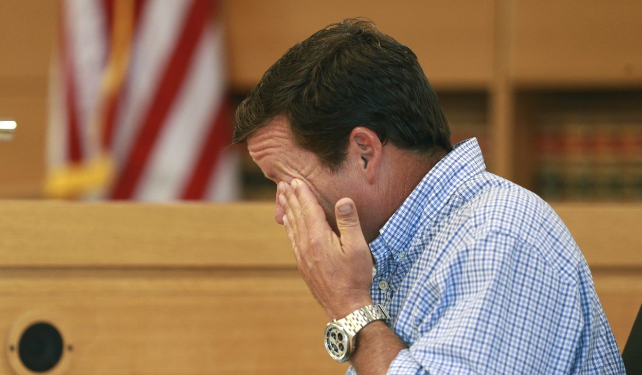 Conrad Roy, Jnr wipes away tears while testifying about the loss of his son during his victim impact statement before Michelle Carter's sentencing for involuntary manslaughter for encouraging 18-year-old Conrad Roy III to kill himself in July 2014. Photo: The Boston Herald via AP