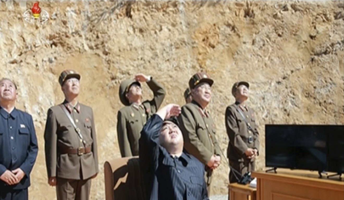 North Korea leader Kim Jung-un watches the launch of a Hwasong-14 intercontinental ballistic missile. Photo: AP