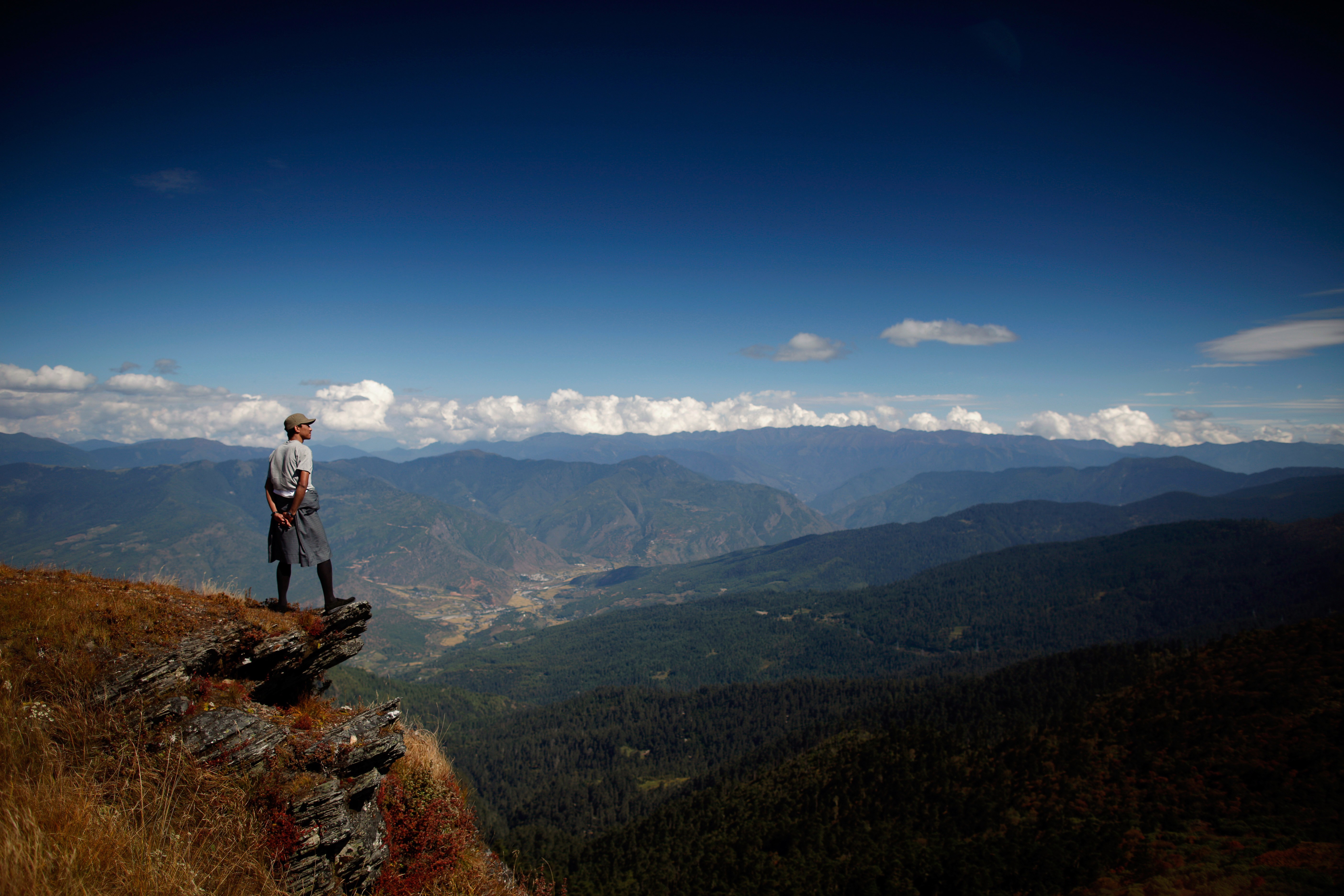 A man looks towards the Paro valley, near the Chele La pass situated between the Bhutanese valleys of Paro and Haa. Many in the Indian media and officials have been propagating a misleading message that Bhutan is a “protectorate” of India. Bhutan has never been a “protectorate”. Photo: AFP