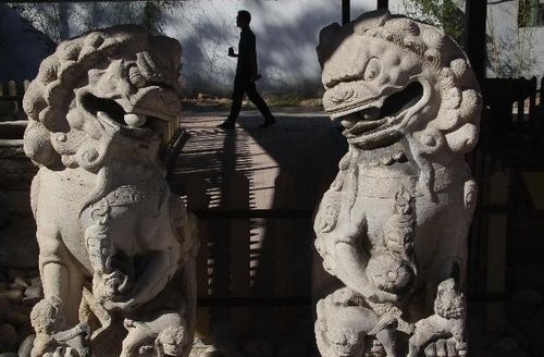 A stone ball has gone missing from the mouth of one of the ancient stone lions at the Old Summer Palace in Beijing. Photo: Handout