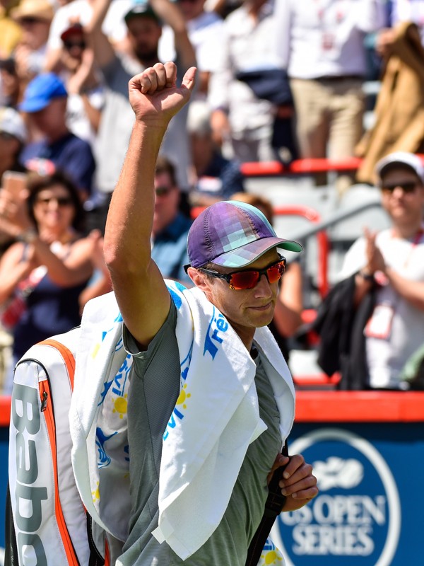 Peter Polansky salutes the fans after his loss against Roger Federer. Photo: AFP
