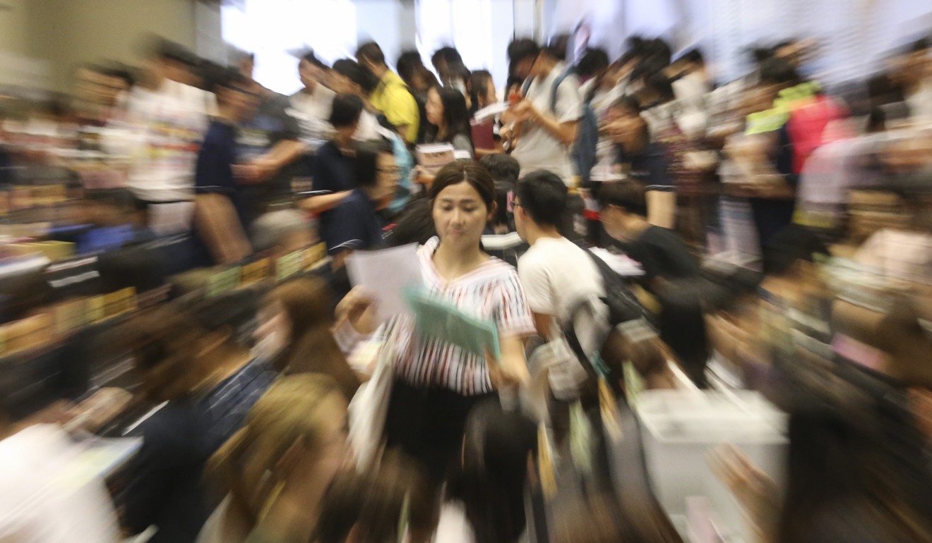 Students apply for self-financed degrees, associate degrees and higher diplomas at a Hong Kong Institute of Vocational Education campus. Students eligible for the annual subsidy will be grateful for the support. Photo: K. Y. Cheng