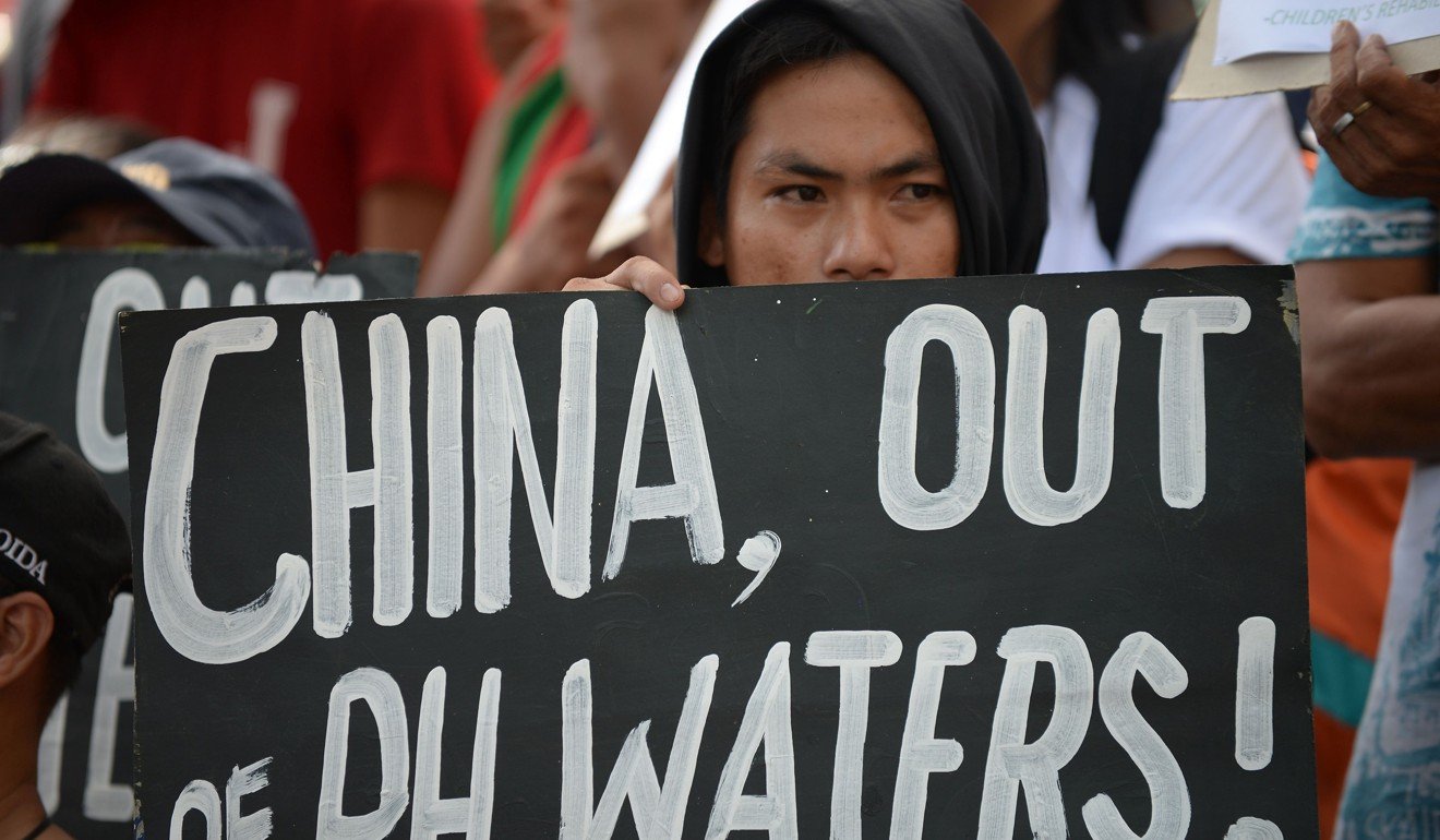 A protester outside the Chinese consulate in Manila. Photo: AFP