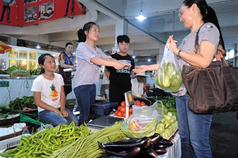 The children worked on their market stall for an average of eight hours a day. Photo: Handout