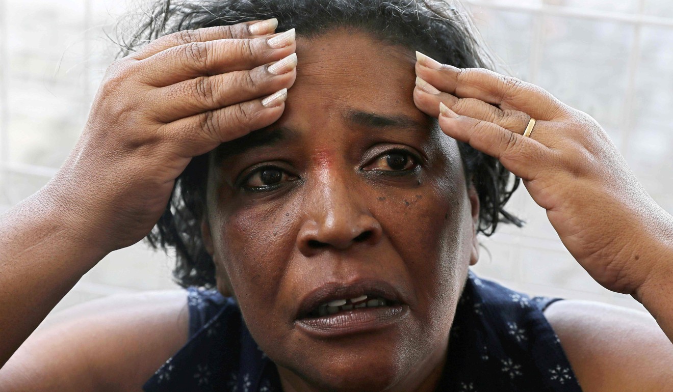 Meire Reis, a survivor from a boat wreck, after a ferry sank off the northeastern state of Bahia, speaks with the press at the Maritime Terminal of Salvador, Bahia State, on August 24, 2017. Photo: AFP