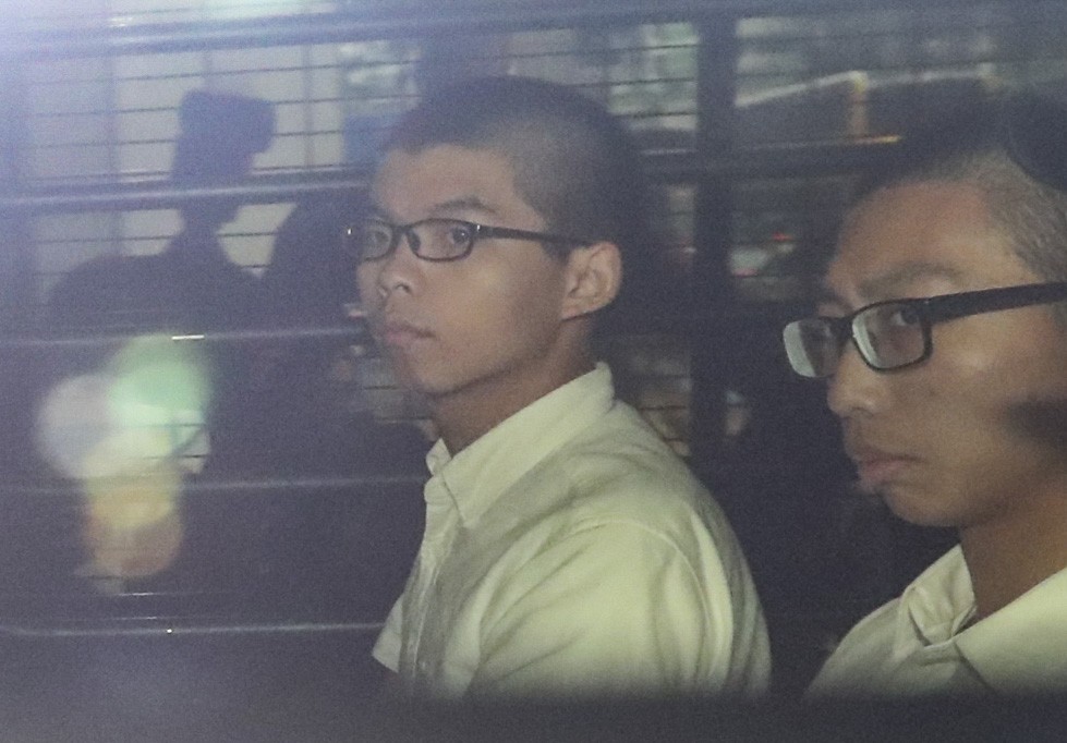 Hong Kong pro-democracy activist Joshua Wong (left) leaving the High Court last Thursday. Photo: Edward Wong