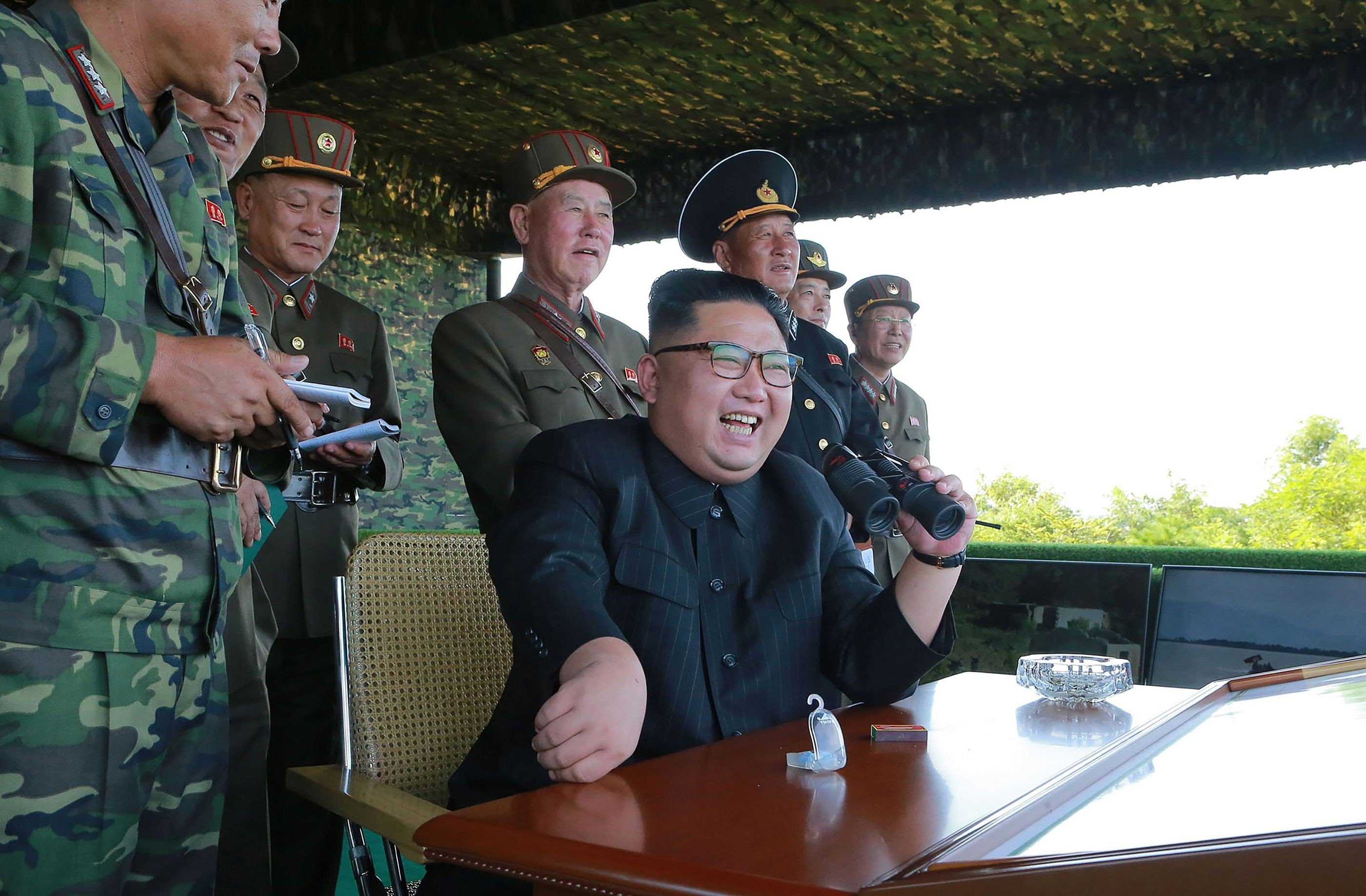 North Korean leader Kim Jong-un presides over a target strike exercise conducted by the Korean People’s Army at an undisclosed location, in an undated photo released on August 26. North Korea fired three short-range ballistic missiles on the day, the US military said. Photo: AFP/ KCNA via KNS