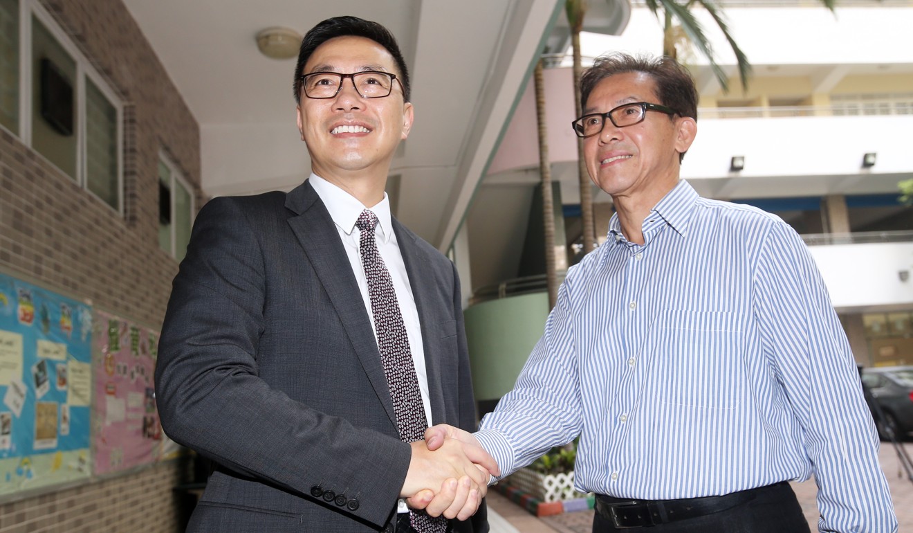 Secretary for Education Kevin Yeung meets Hing Tak School committee member Lau Yi-long. Photo: K. Y. Cheng