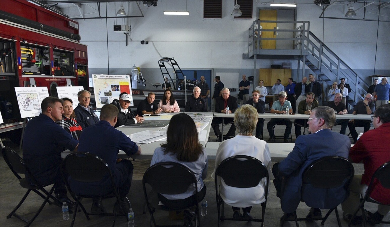 Trump being briefed at Fire Station 5 in Corpus Christi. Photo: EPA