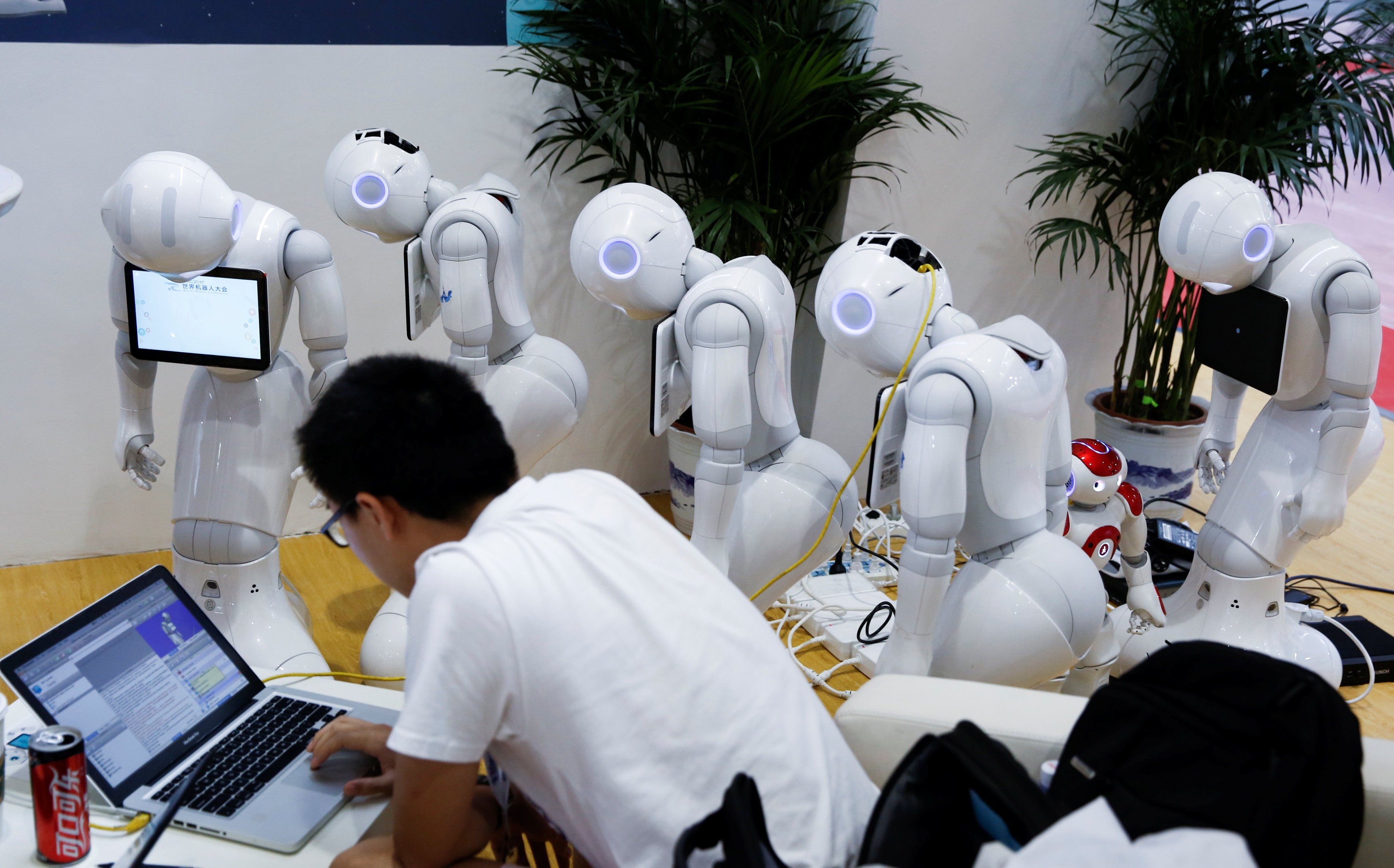 A technician prepares SoftBank Robotics ‘Pepper’, a humanoid robot, at the 2017 World Robot Conference in Beijing on August 22, 2017. Photo: Reuters