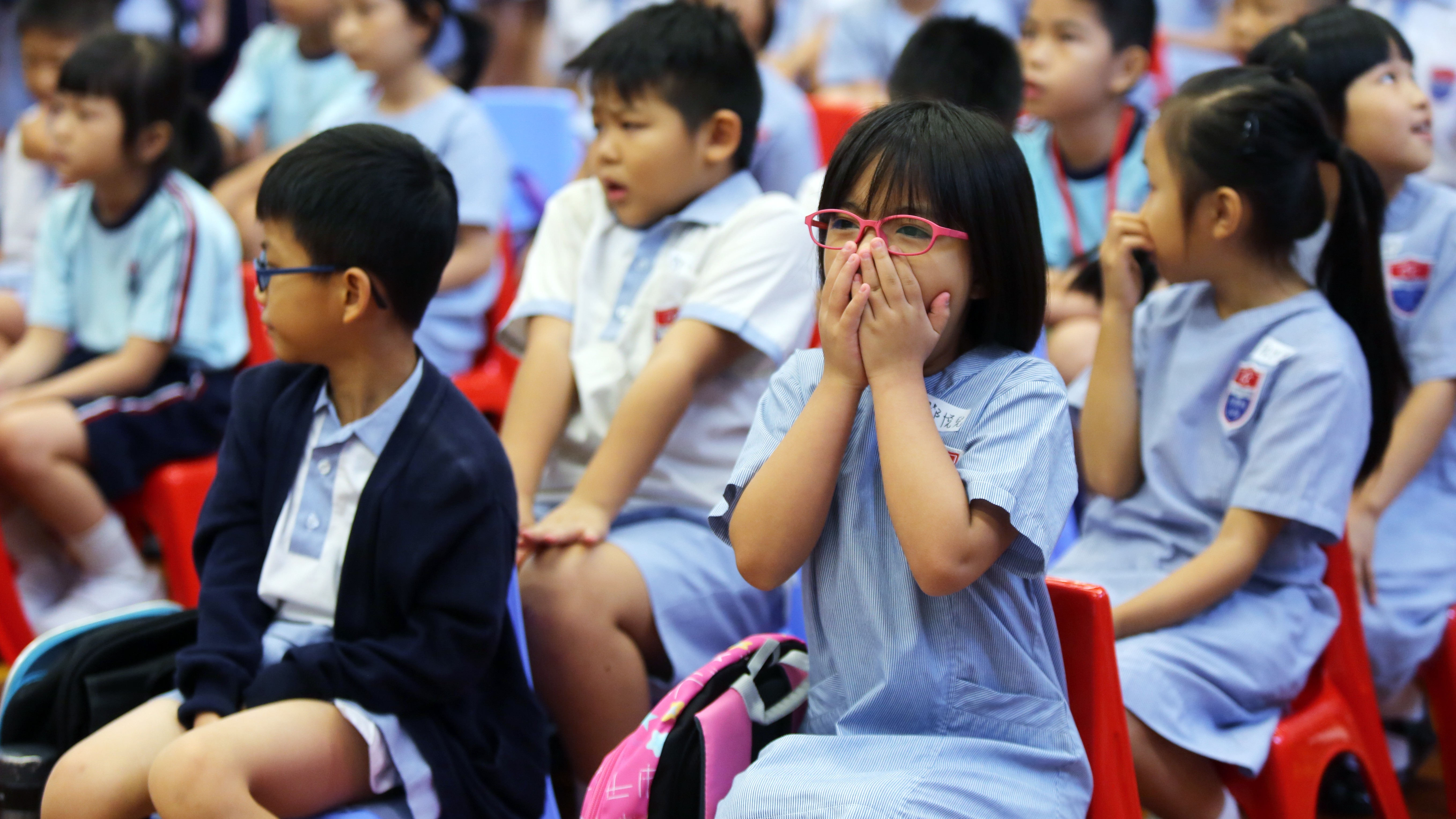 Some mainland parents are still sending their children to Hong Kong schools. Photo: Xiaomei Chen