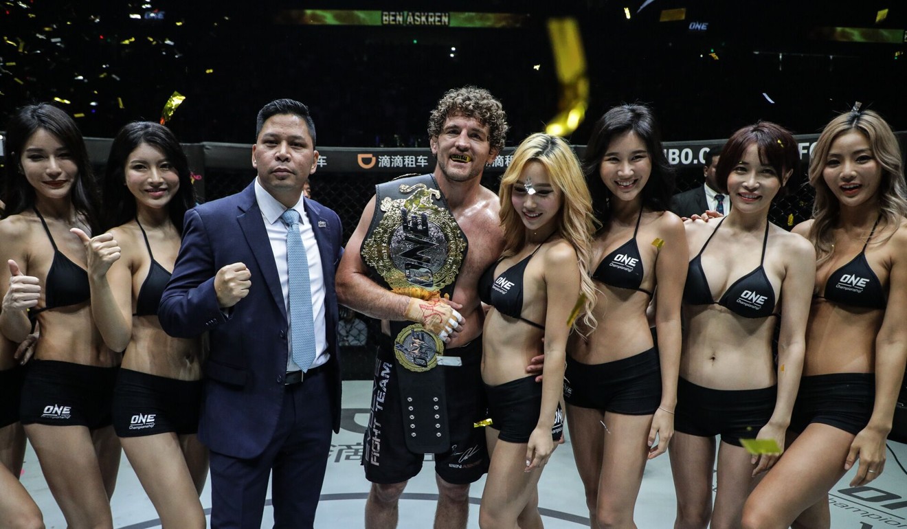 Ben Askren celebrates with a bevy of beauties after continuing his win streak.