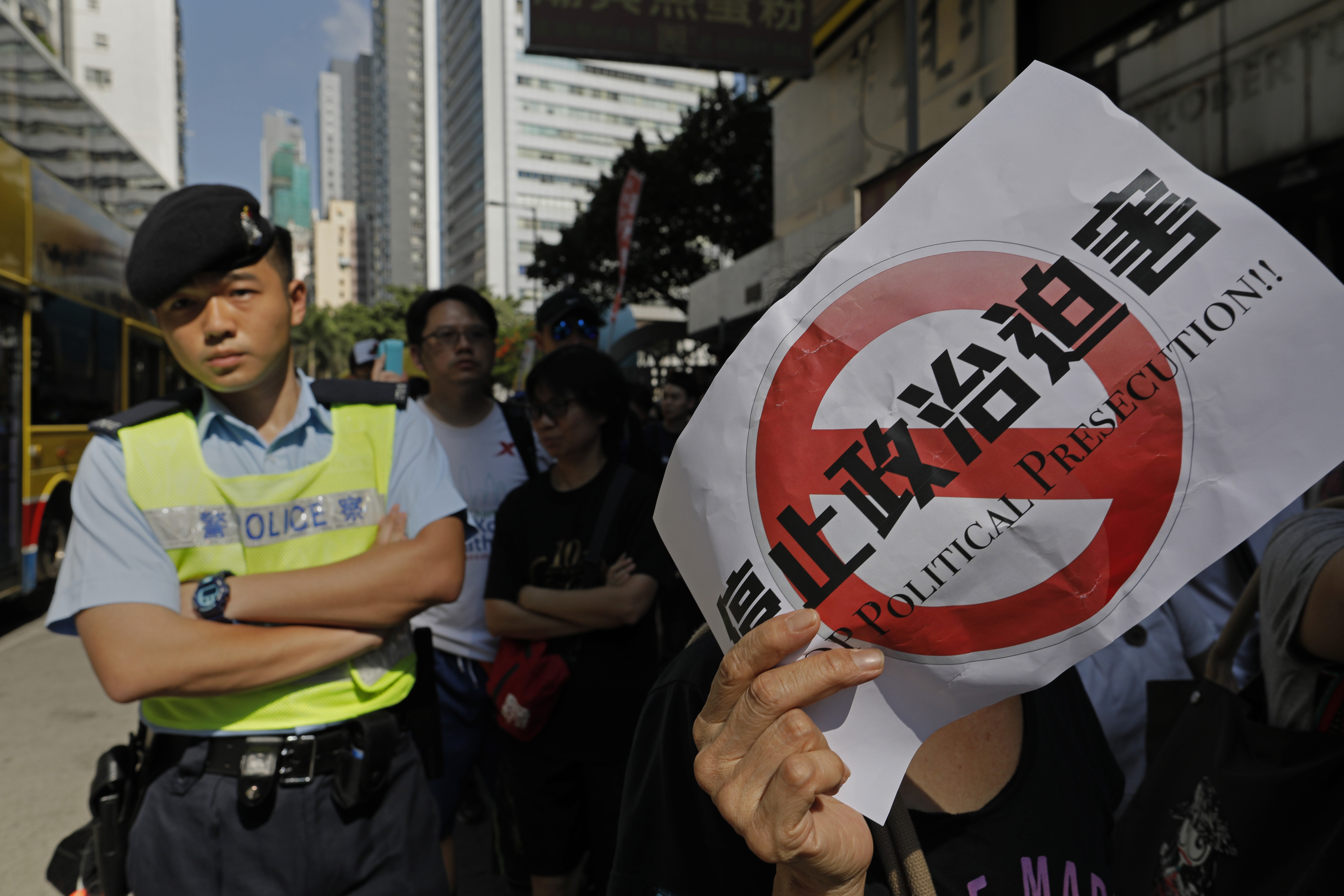 A protester taking part in a rally last month alleges that the recent jailing of three pro-democracy activists was political persecution. When disagreement over a court ruling strays into attacking a legitimate process of law, such as a prosecutor’s right of appeal, it is the rule of law itself being attacked. Photo: AP