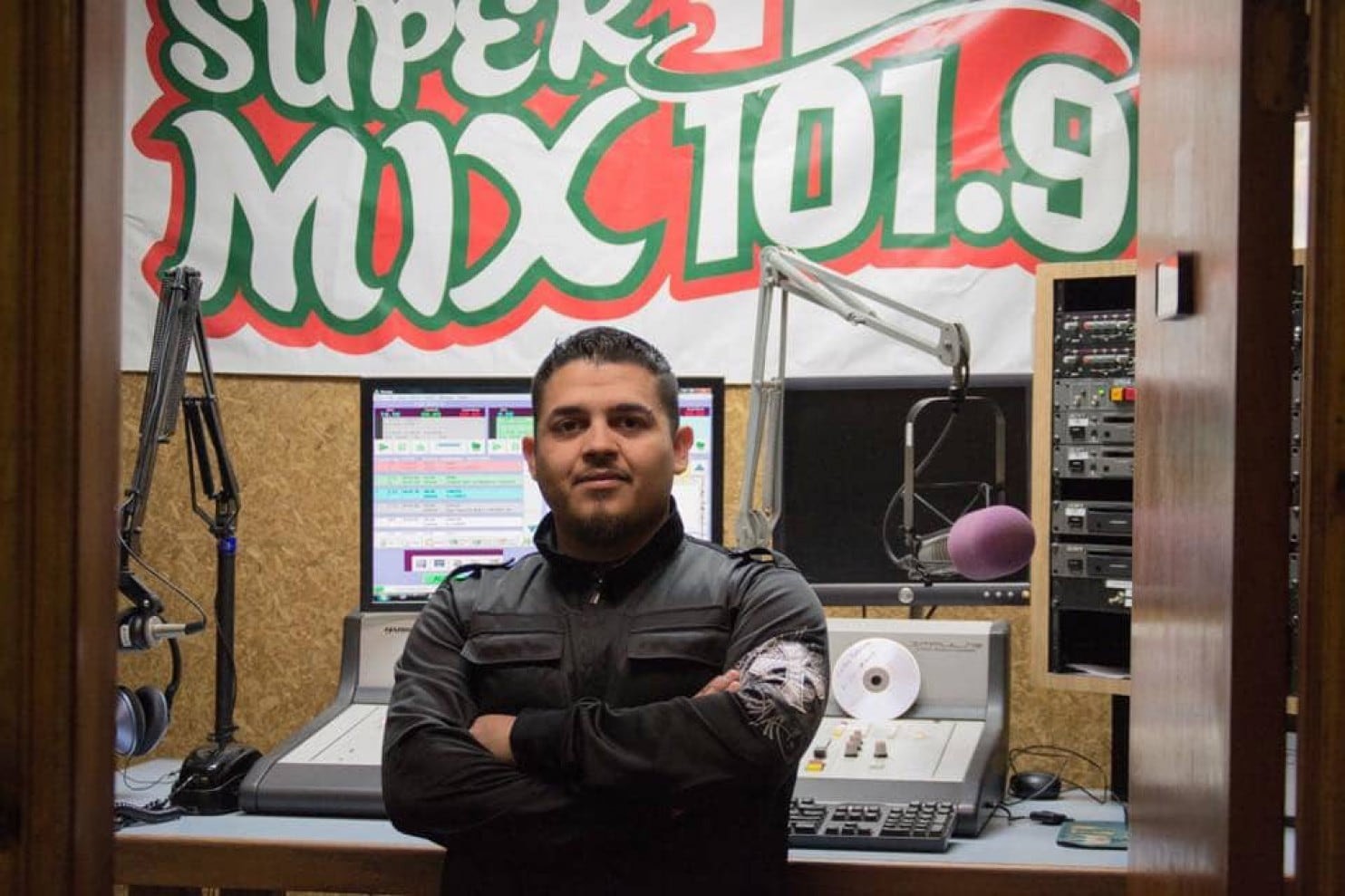 Alonso Guillen is pictured at his job as a radio host in Lufkin, Texas. He died trying to rescue victims of flooding in Houston. Photo: Courtesy of Jesus Guillen