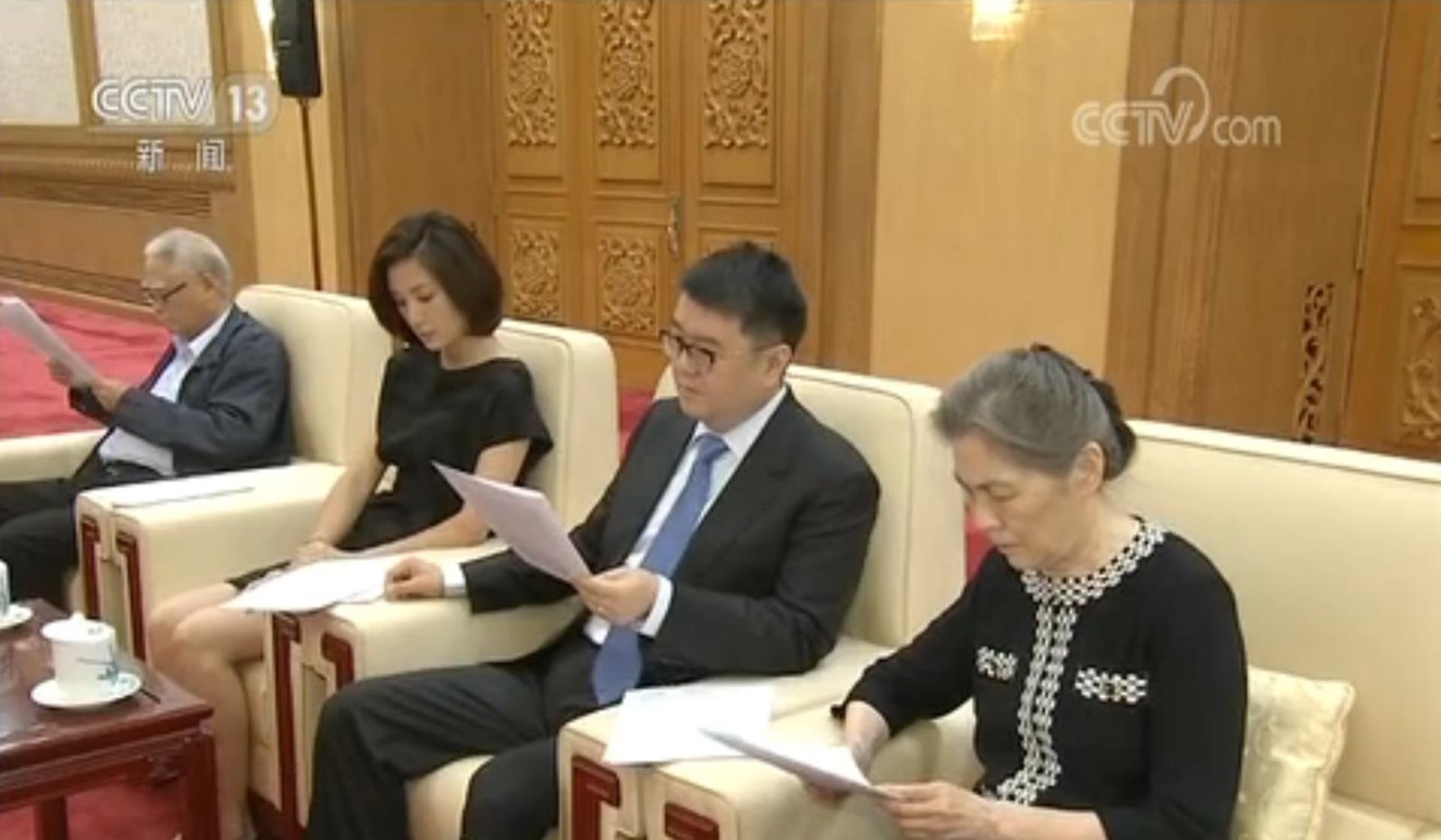 Relatives of Yao Yilin attend the seminar in Beijing. Photo: Handout