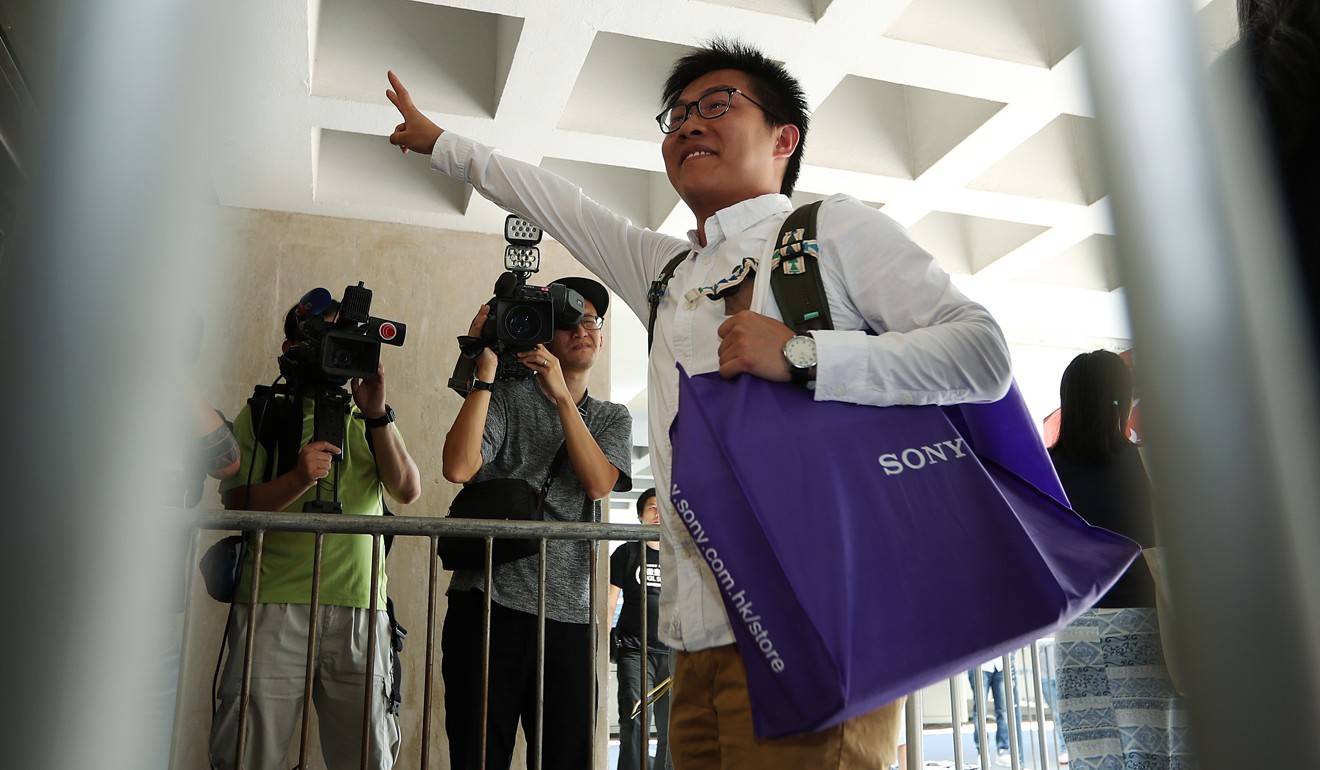 Raphael Wong was among 13 protesters jailed for storming the Legislative Council against a land development plan in 2014. Photo: Nora Tam