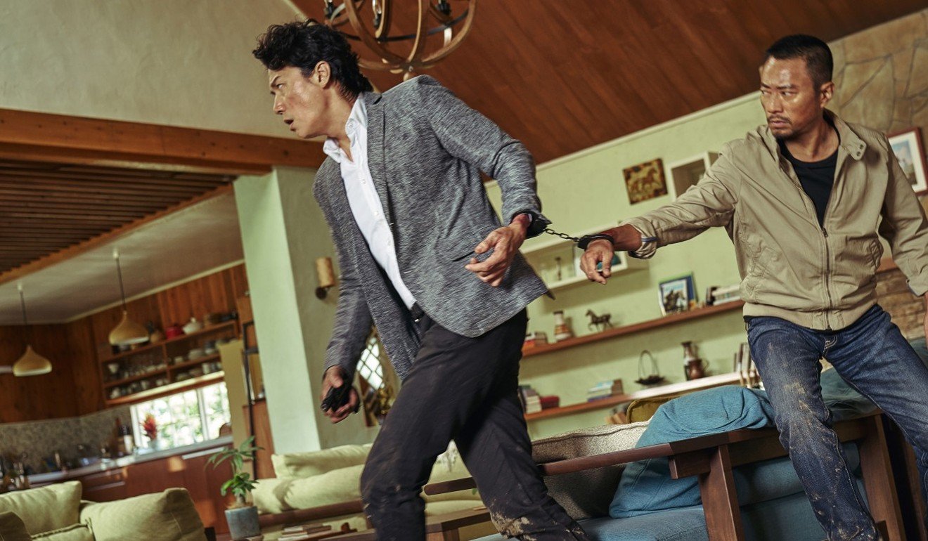 Zhang Hanyu (right) and Masaharu Fukuyama in a still from Manhunt.