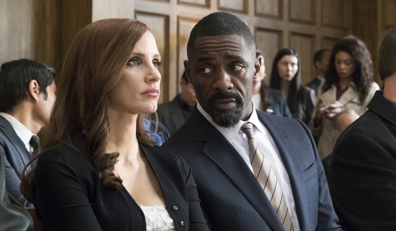 Chastain and Idris Elba in a still from Molly's Game. Photo: Michael Gibson
